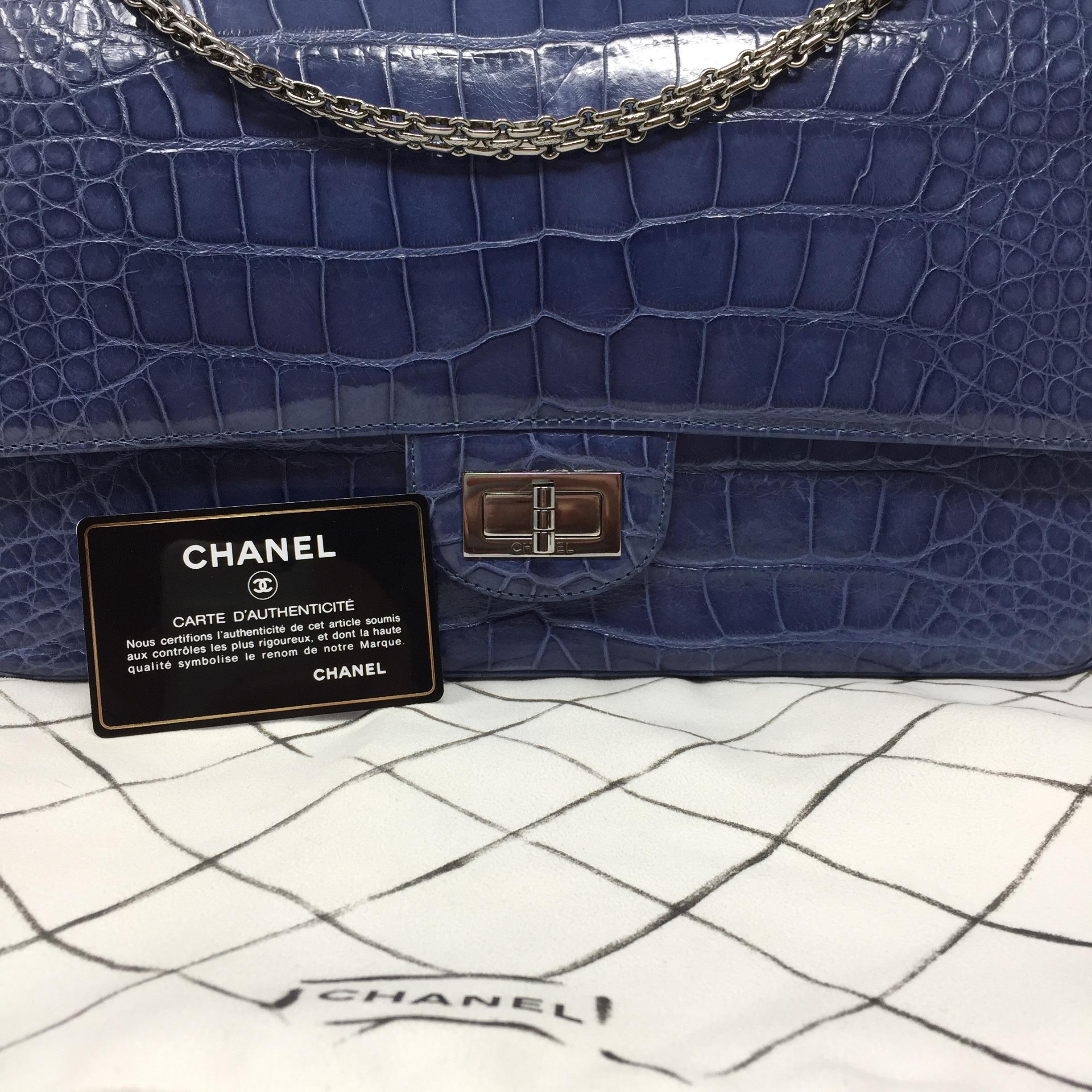 Chanel Blue Sapphire Crocodile 2.55 Reissue Double Flap rare and amazing exotic piece, this strikingly beautiful bag is a must have for any collector. Vibrant shine blue sapphire crocodile skin double flap is paired with edgy ruthenium hardware.