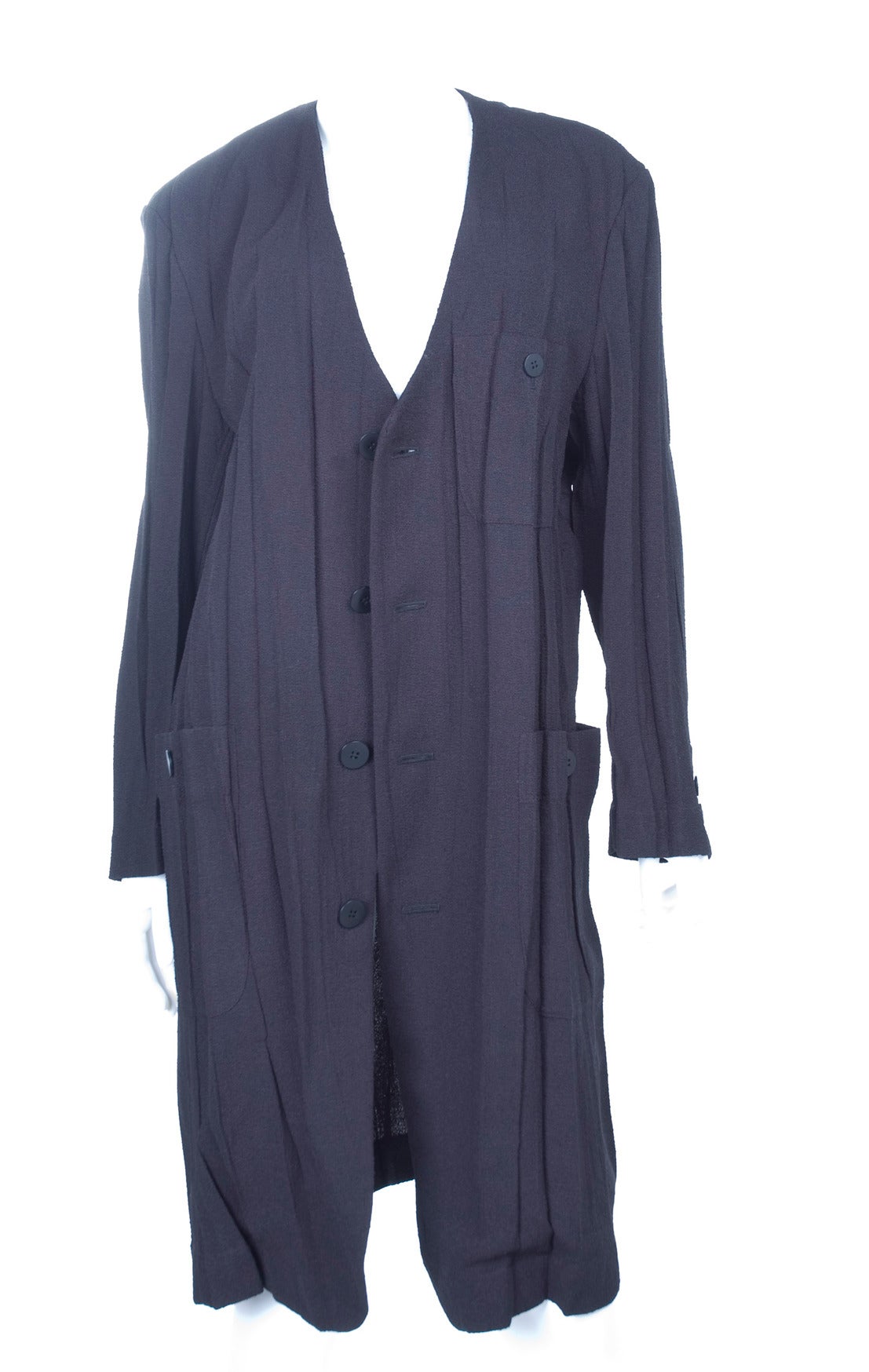 80's Issey Miyake Black Long Jacket or Coat.
In excellent condition.
Size L 

Measurements:
Length 96 cm - 38