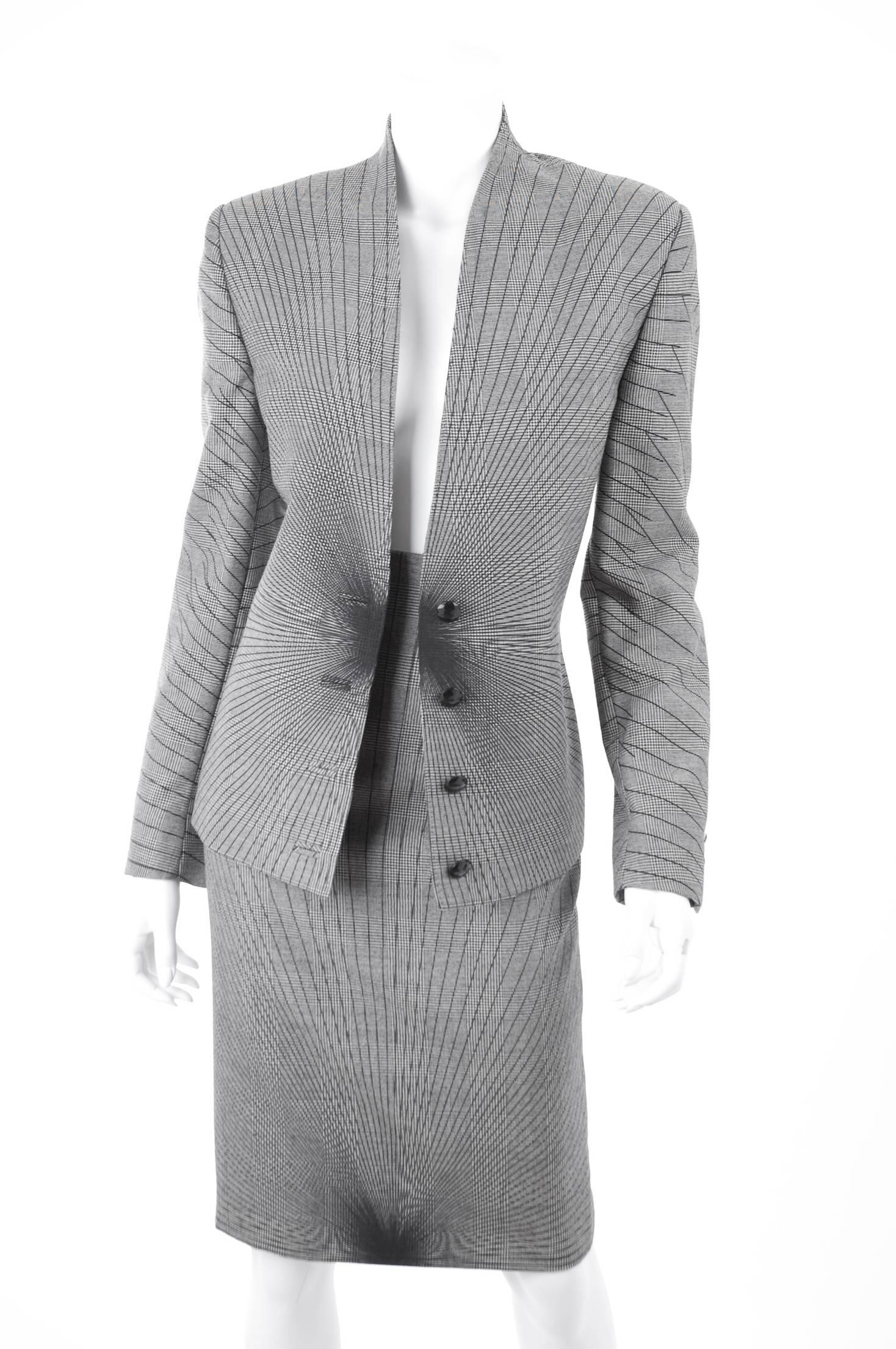 90's Gianni Versace Couture Suit in black and white with optical illusion pattern.
Size Italy 46 - US 8 
Perfect condition.
Measurements:
Jacket: length 25.5
