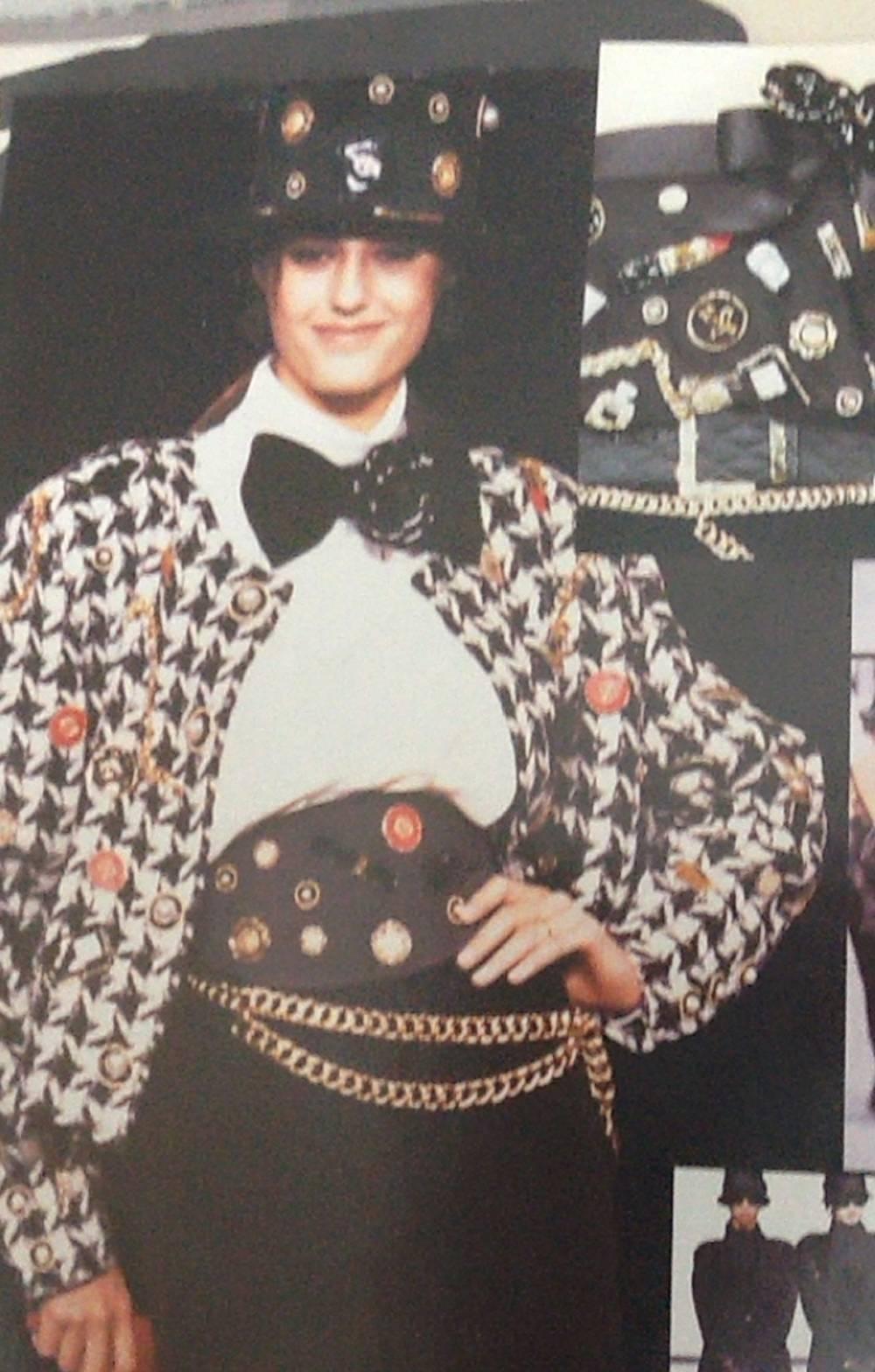 80's Rare Chanel jacket with jewel appliques and embroidered details.
This iconic Chanel jacket, in black and white houndstooth pattern, is embellished with elaborate hand-embroidery. All over  small motifs created with appliquéd red leather and