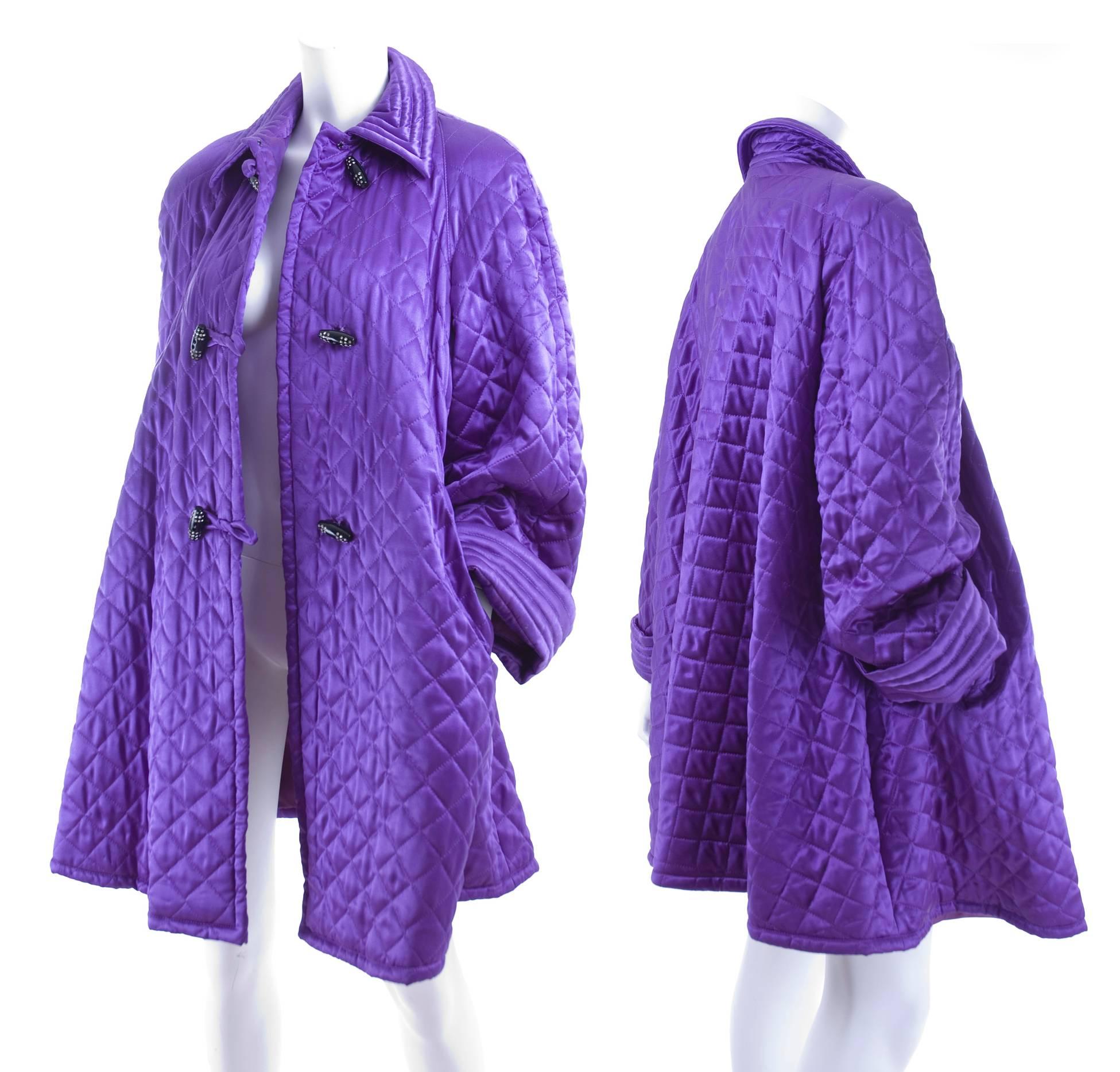 Vintage Valentino quilted silk coat in purple. The coat is lightweight and the toggle buttons are black with rhinestones. 
The size label is EU 38 but I think it is a large. 
Material: 100% Silk 
Excellent condition.
Measurements:
Length 34 - bust