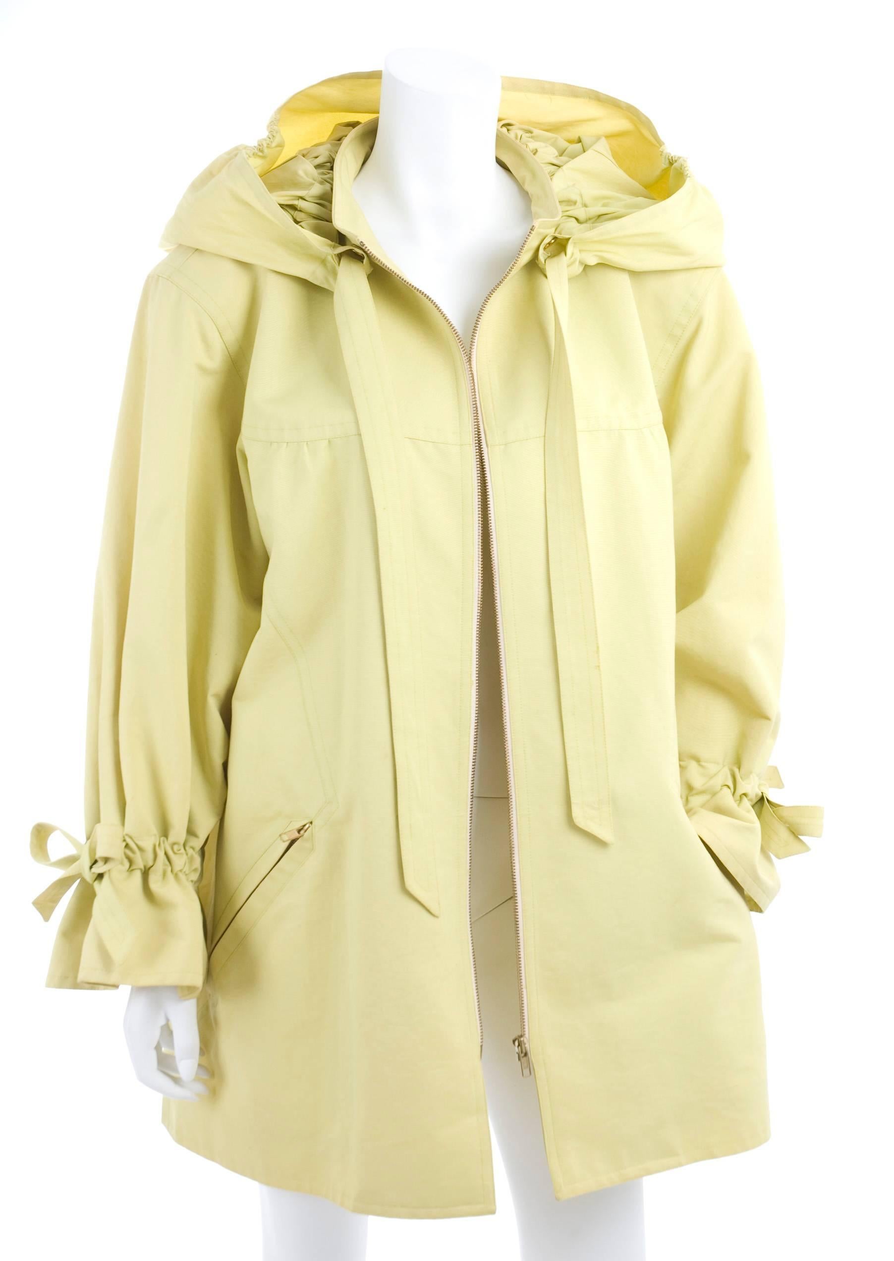 Christian Lacroix Outdoor Jacket or Overcoat in lime green.  
100% Cotton. 
Excellent condition - no flaws to mention. 
Size US 12  
Measurements: 
Length 33