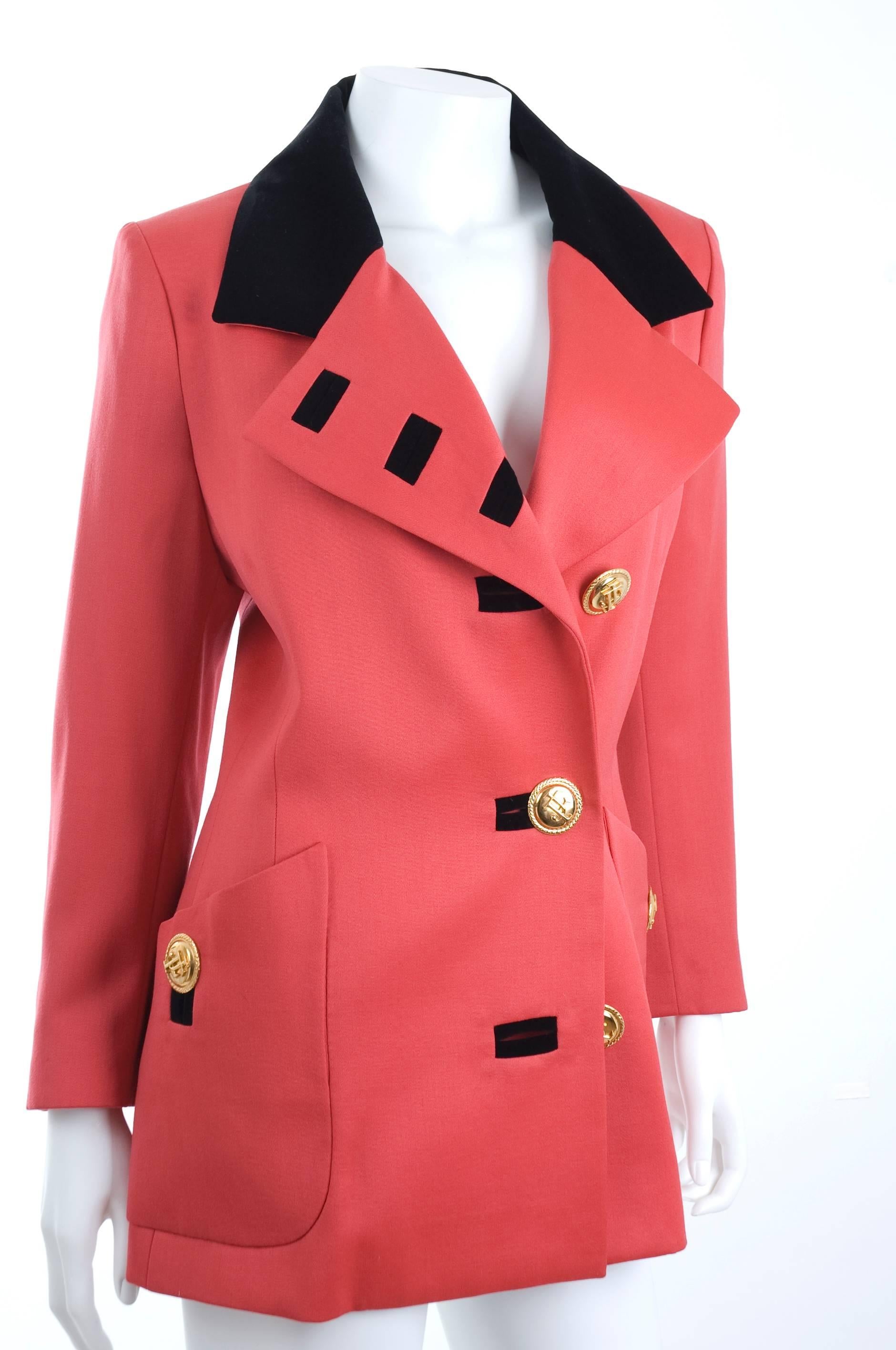 Jaques Fath Jacket in lipstick red and black velvet details. Gold tone Buttons
In excellent condition - no flaws to mention.
-- The Fath design house closed in 1957 and relaunched by the France Luxury Group in 1992. This Jacket is from that