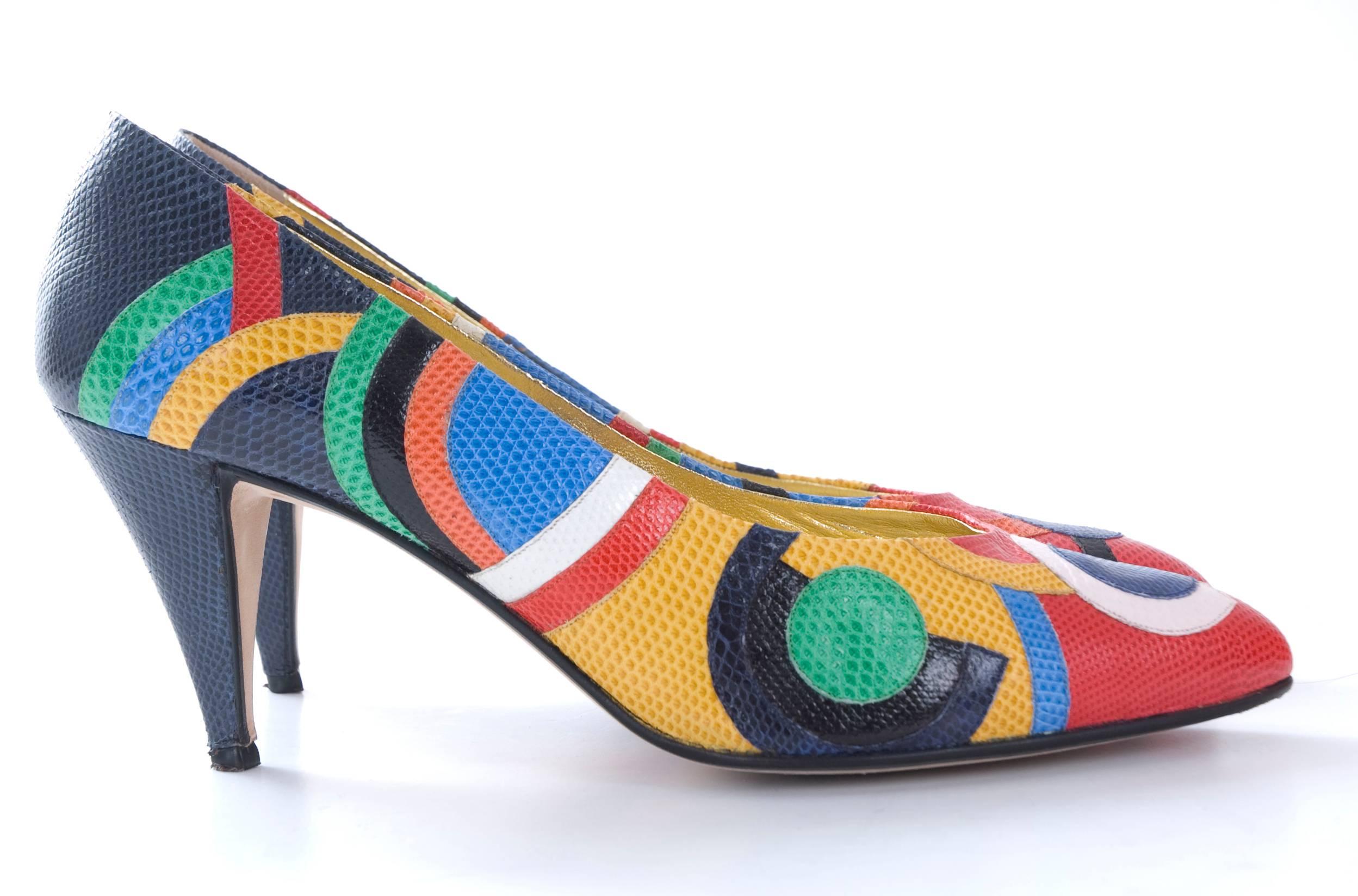 1980s Andrea Pfister Karung snakeskin high heels in a colorful pattern.
Colors are: Navy, red, yellow, blue, black,orange and green.
They have been worn on a photo shoot for 15 minutes and in excellent condition. Come in the original Box.
Museums
