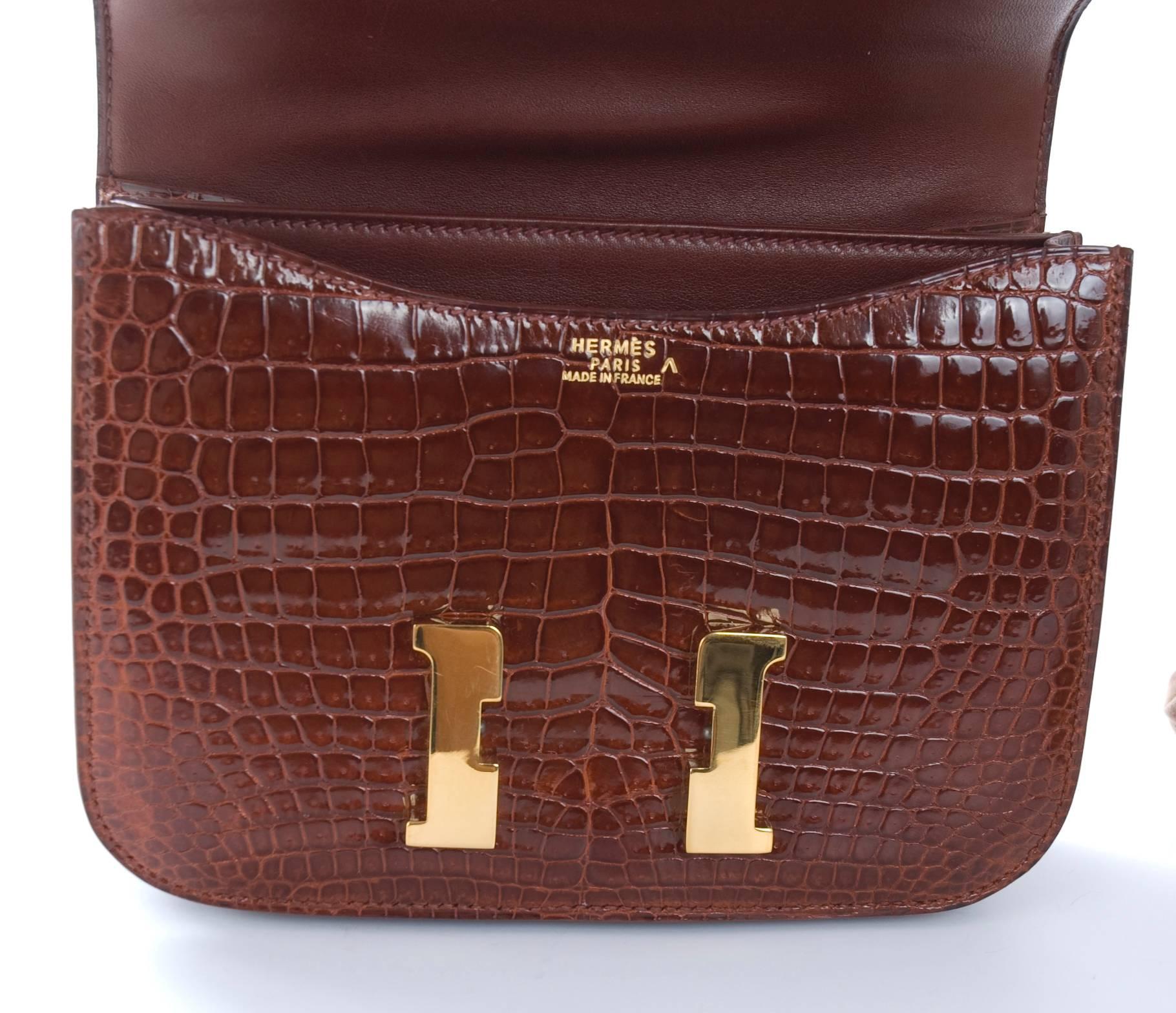 Women's Hermes 18cm Mini Constance Bag Double Gusset Shiny Porosus Crocodile in Cognac For Sale