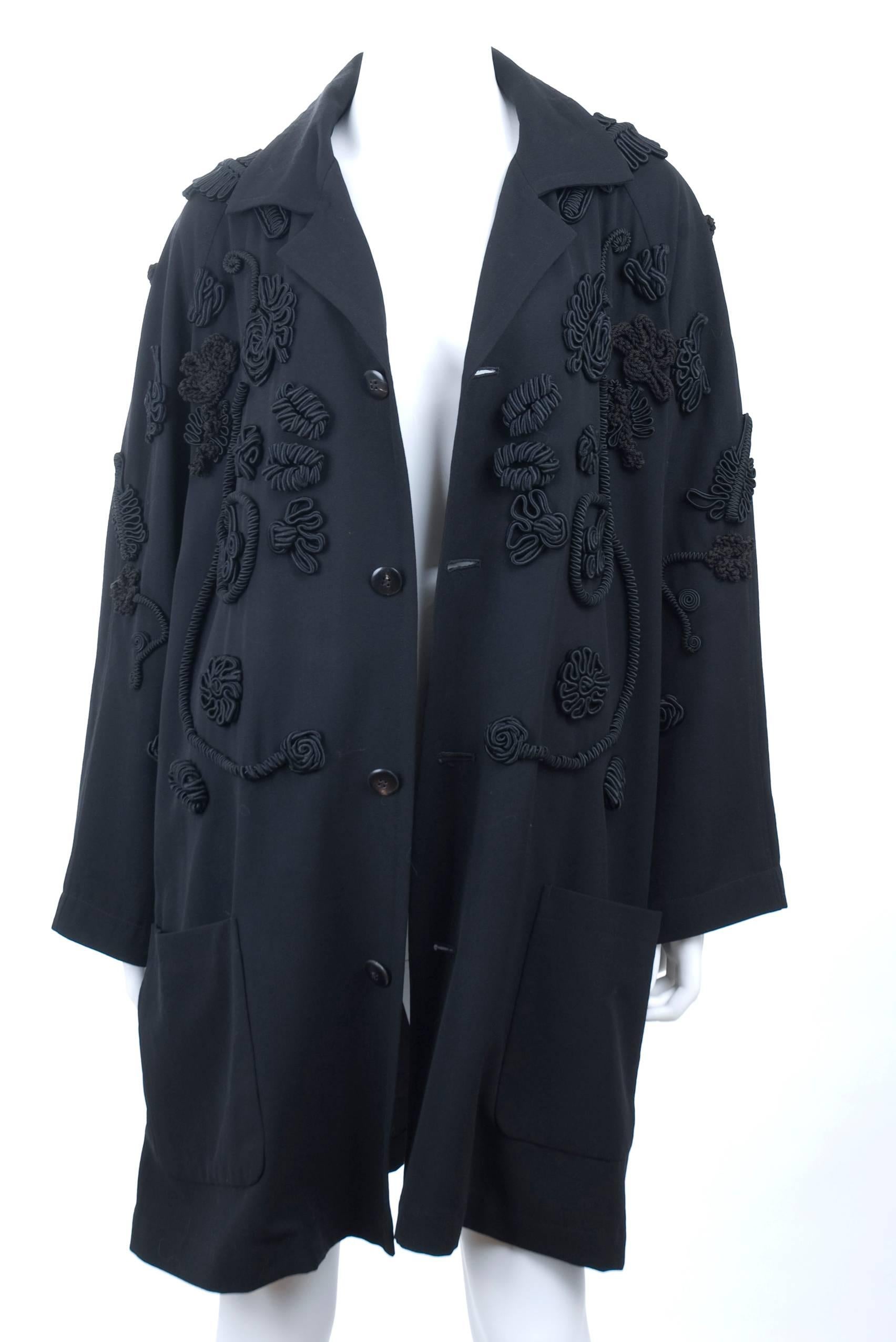 Amazing vintage 90's Yohji Yamamoto black coat with corded embroidery and tassels allover. The fabric is 100% very fine wool and lined with cupro.
It's in excellent condition and truly no flaws to mention.
Size: M
Measurements:
Length 34 - bust 48 -