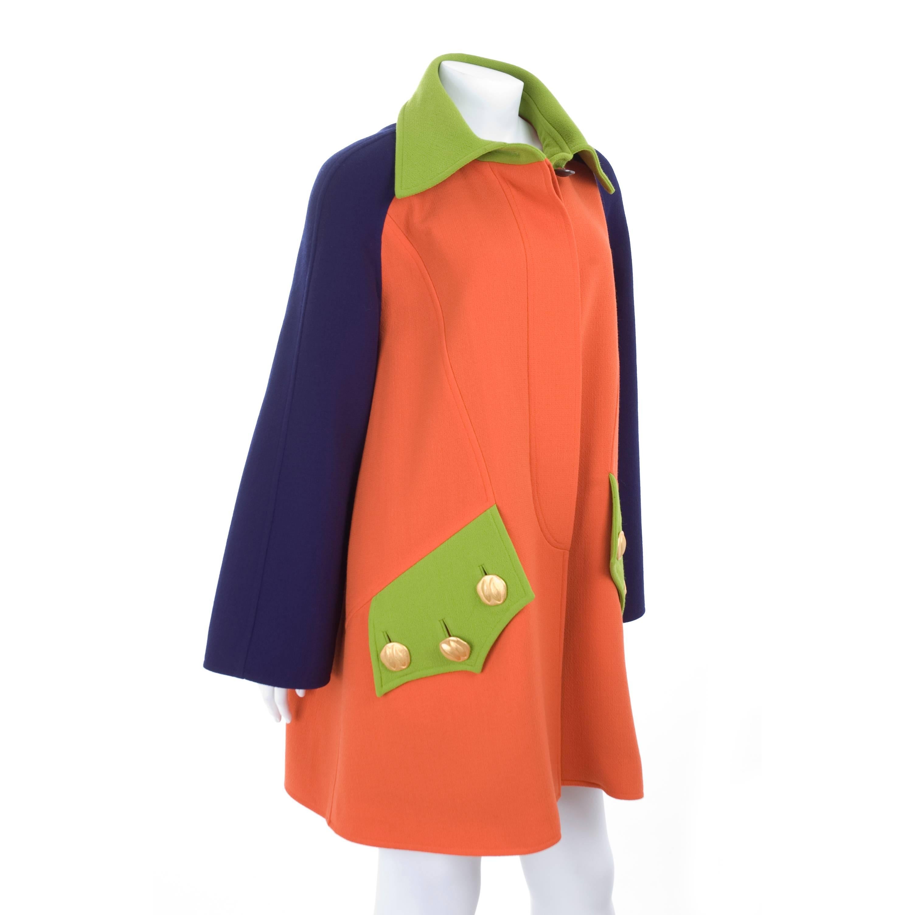 90's Christian Lacroix color block coat in orange, blue & green, Beautiful wool fabric and lining in black with white dots.
Size label is missing about 44 Fr or 12 US
Excellent condition - no flaws to mention.
Measurements:
Length 33.5 - bust 50