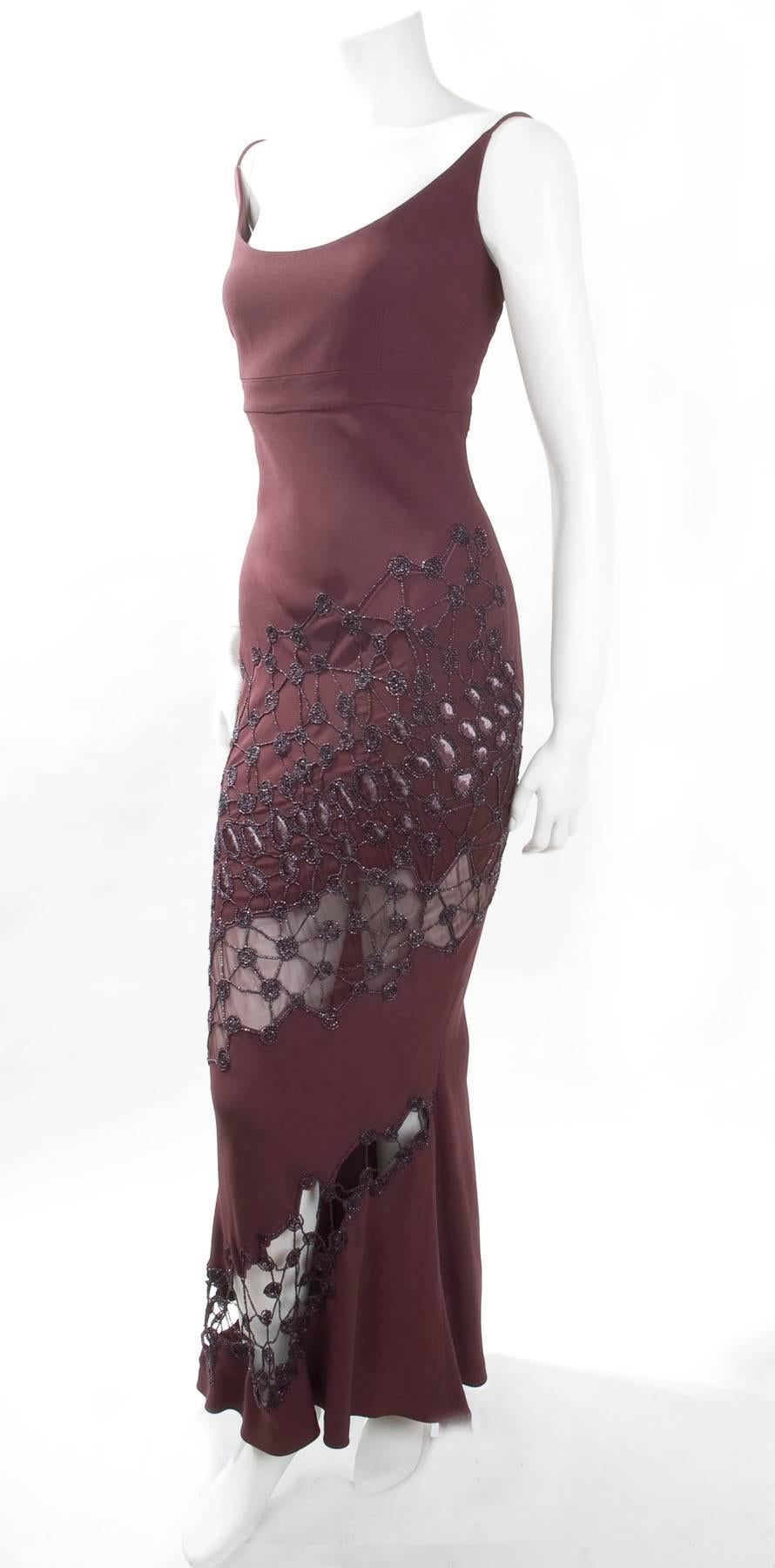 Vintage Angelo Mozzillo evening dress wonderful pattern embroidered with beads. Back closure with small buttons. The color is a deep burgundy red.
Fabric is acetate and viscose.
Excellent condition - worn once.
Size 42 IT - circa 6