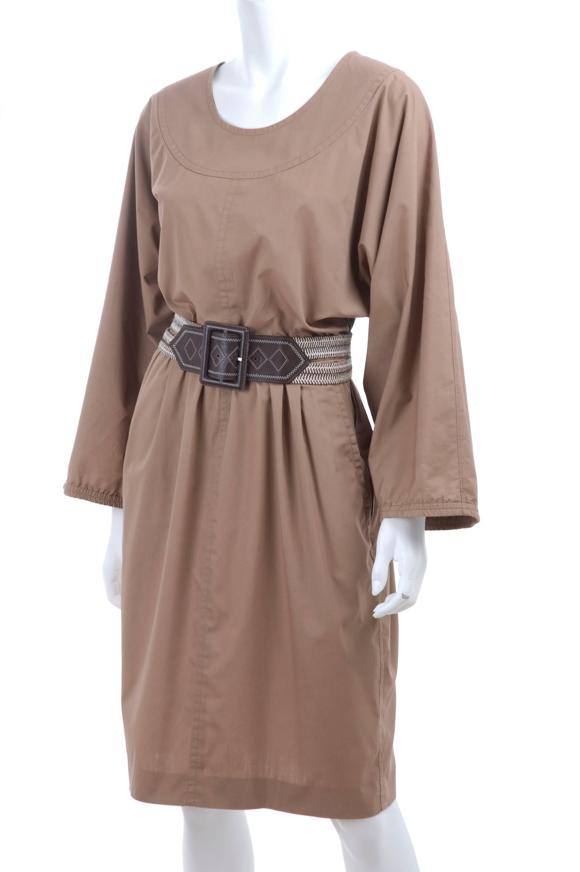 Vintage 80's Yves Saint Laurent cotton dress in light brown with a wonderful mtaching belt. 2 side pockets and big sleeves. The sleeves used to be elastic and the wrist, but for the moment I think it's nice to wear them open. If you prefer a tider