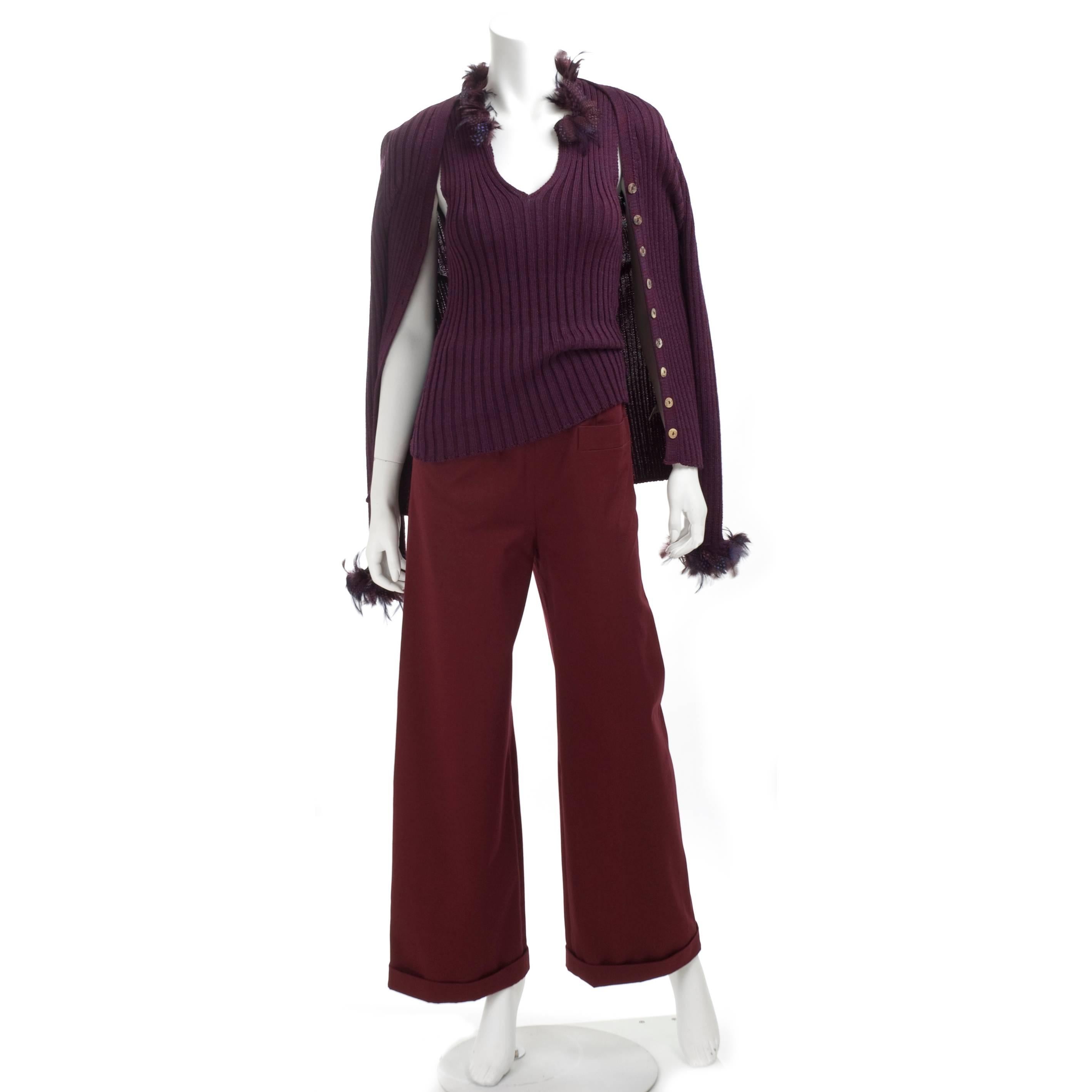Vintage 90s Yves Saint Laurent Ensemble - Twinset with Guinea Fowl Feathers.
The twinset in 2 tone aubergine and brick red, same as the wide leg pants.
Material: 50% Wool - 45% Viscose and 5% other fibers, pants are cotton twill.
Beautiful feathers