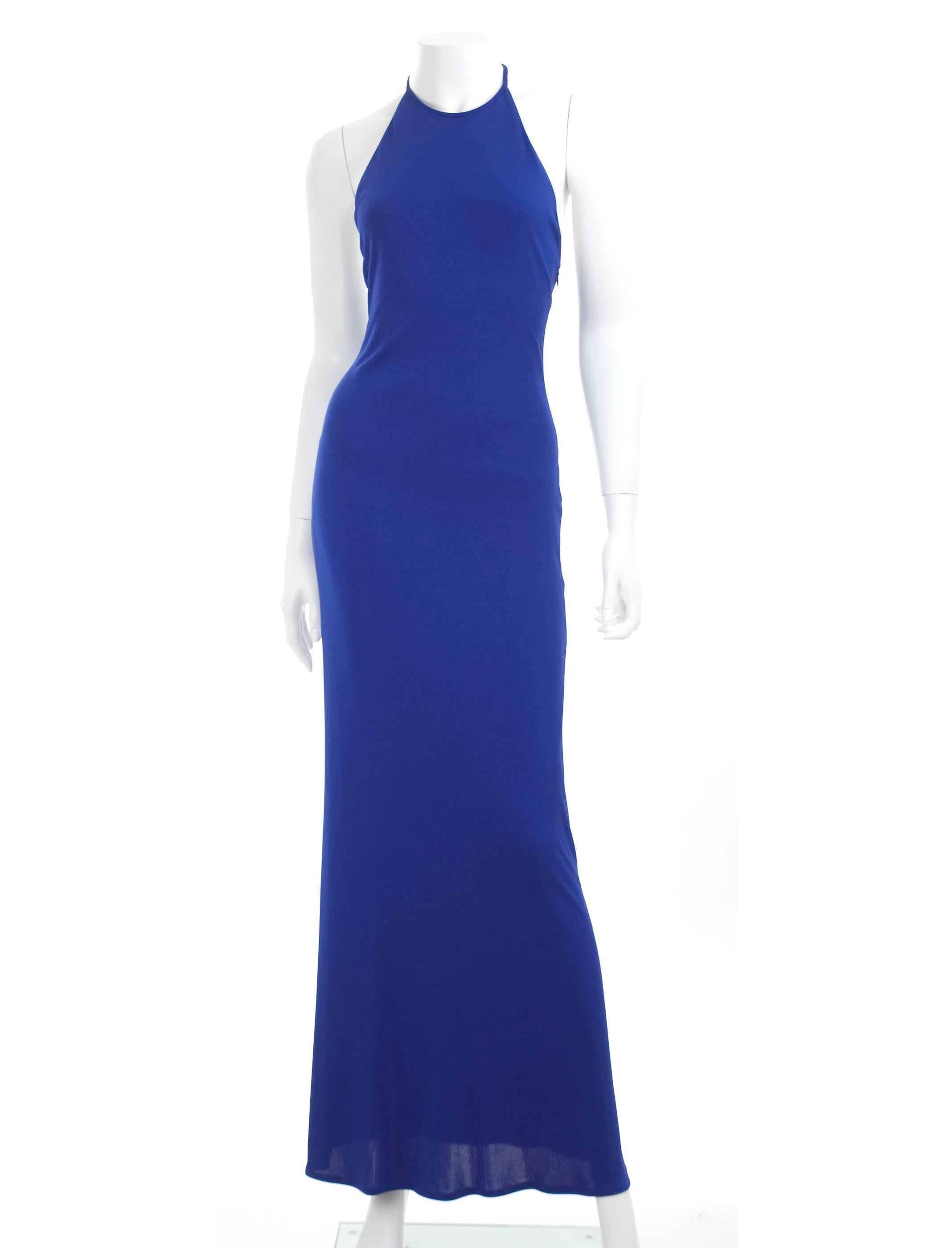 Emilio Pucci evening dress in blue viscose jersey. Wonderful back detail, beads on a multi blue pattern stripe. Closure around the neck with a hook, side zipper.
In excellent condition.
Measurements:
Length 56 - bust 33 - waist 26 inches
