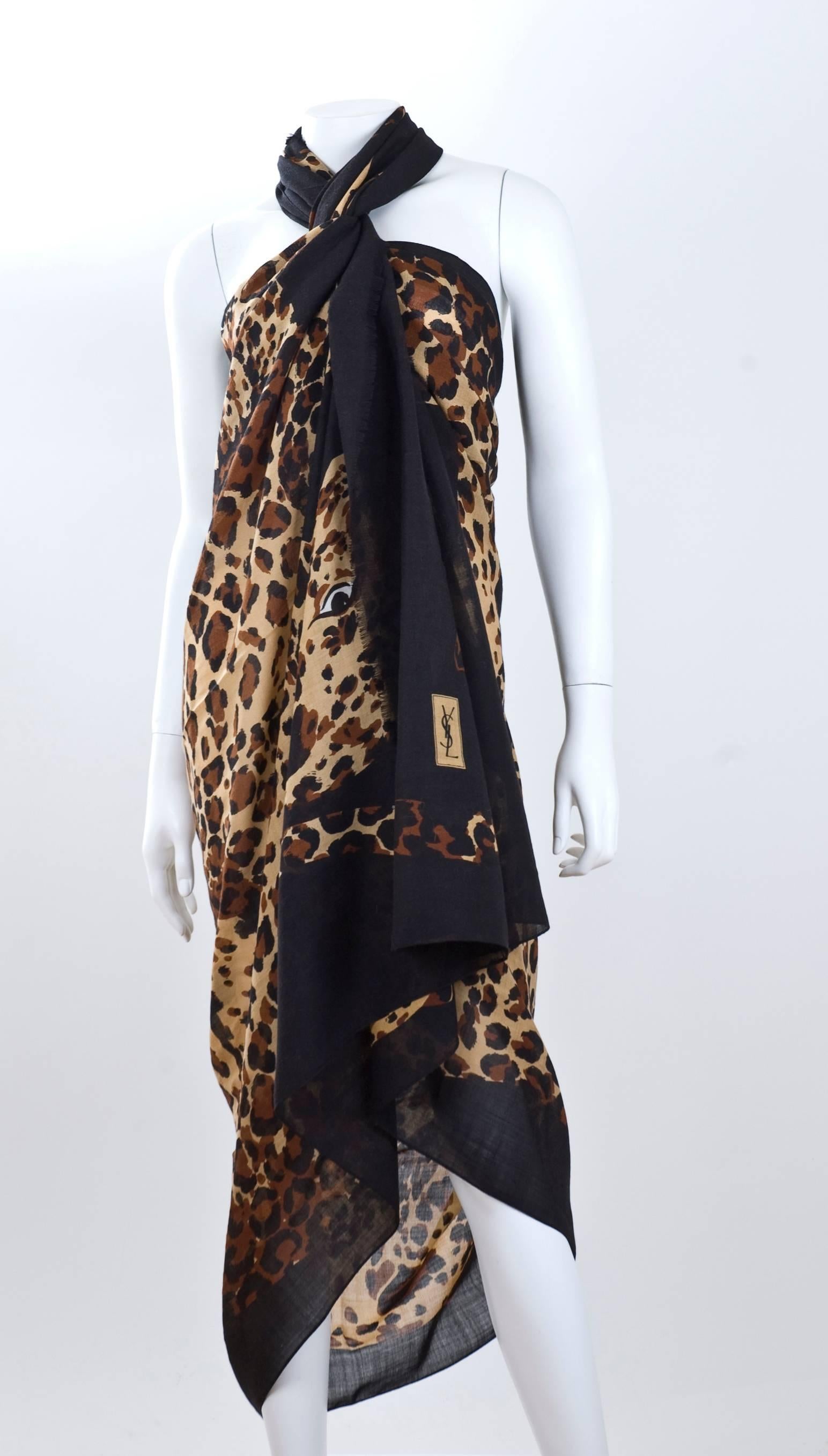 Vintage 1980's Yves Saint Laurent giant wool muslin scarf, wrap, sarong with Leopards woven in.
Size 90 by 54 inches - 230 cm by 135 cm
Color: black, camel and brown
Excellent condition - no flaws to mention
