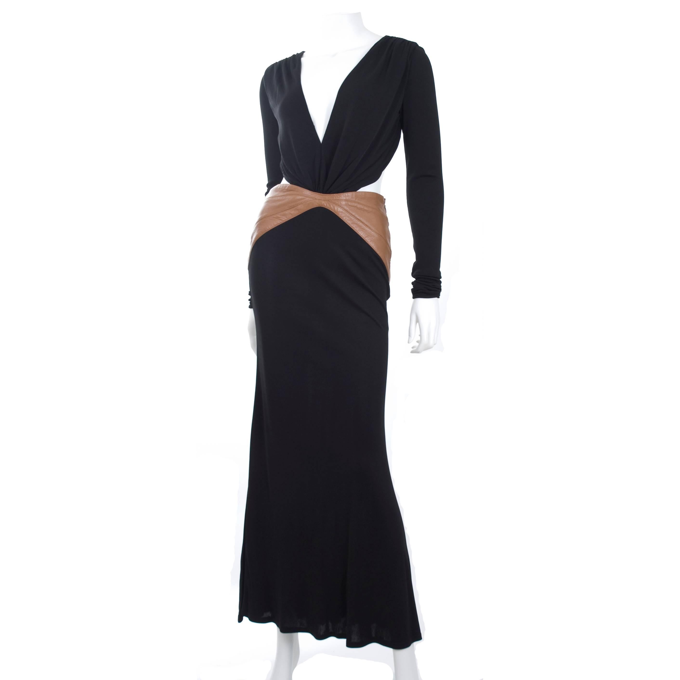 Rare 90s vintage GIANNI VERSACE COUTURE black viskose with tan leather around the hips.
Hook closure in the neck, zipper on the side.
The Dress has been worn and is in very good condition, it has been professional dry cleaned.
Measurements:
Length