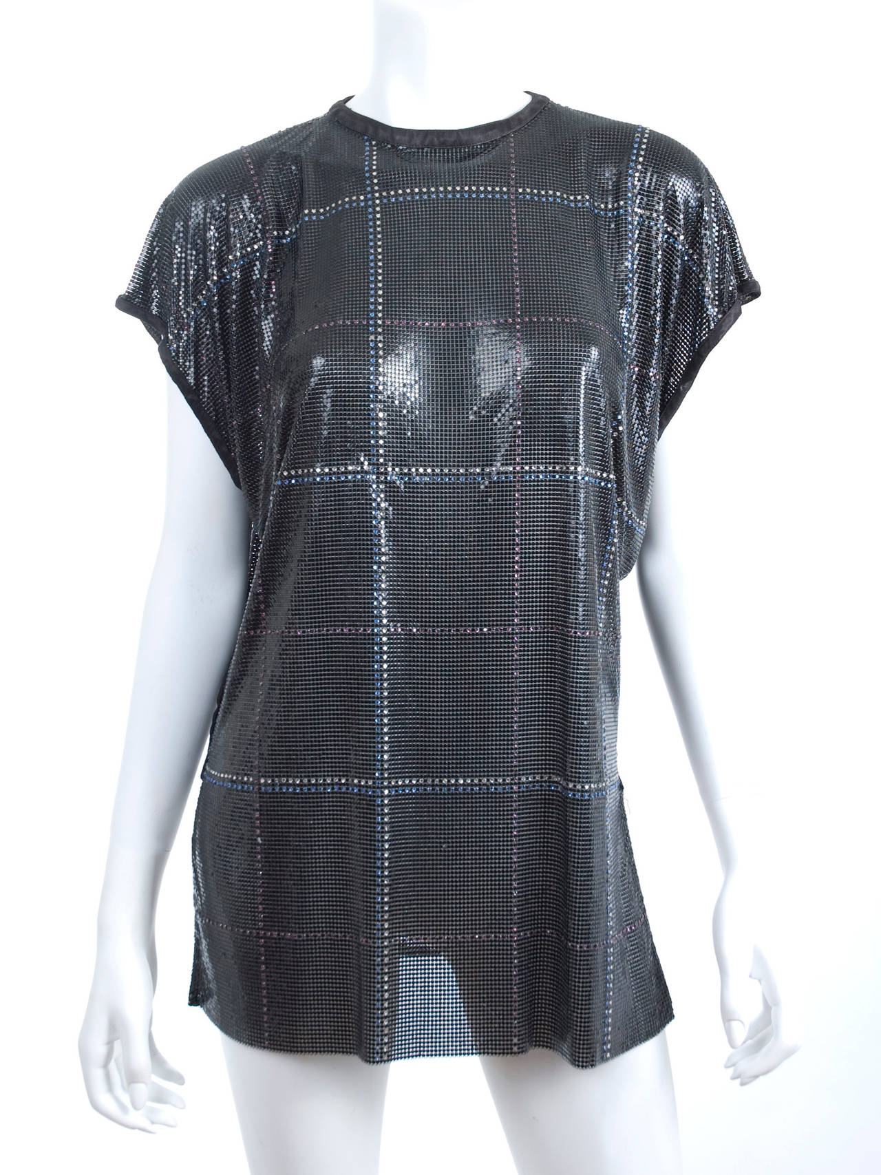 Rare 1982 Gianni Versace Oroton Metal Mesh Top.
The top is black with white, blue and pink rhinestones.
App. 10 small pieces/stones are missing. Please see close up picture.
Size label is missing -  It's possible mens size