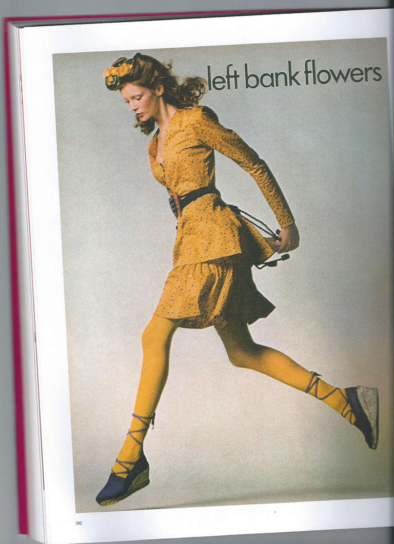 1971 Yves Saint Laurent Cotton Dress with Double Heart Belt.
As see in Yves Saint Laurent:Style book.
Front button closure and hidden zipper for the skirt.
Excellent condition
Size 40 EU - about 6 US

Measurements:
Length 36
