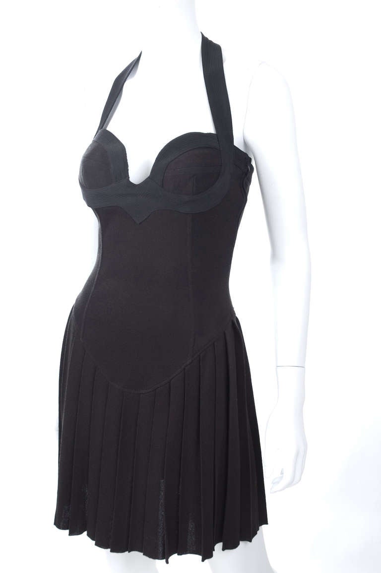 Vintage Gianni Versace Black Knit Halter Dress.
Circa 1980.
60% Cotton and 40% Polyester
Size EU 42 - 6 US
Excellent condition.
Measurements:
Length 37