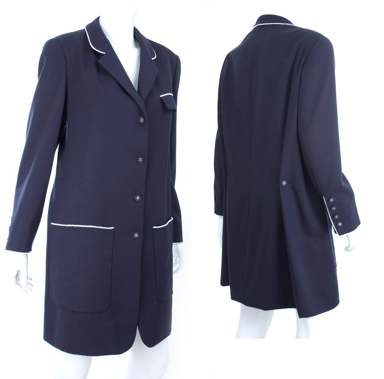 1996 Chanel Long Navy Jacket or Coat. The Buttons with silver CC Logo.
Size 48 EU 
Excellent condition - Dry cleaned.
Virgin wool and silk lining with the CC logo

Measurements:
Length 38