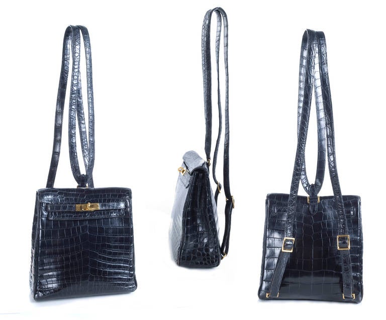Hermes Shiny Black Nilo Crocodile Kelly Ado Backpack Bag.
Adjustable straps, chevre leather interior with one slip pocket.
Comes with Hermes dustbag.
Year stamp A in a square 1997
Very good gentle used condition.

Measurements in cm:
Length