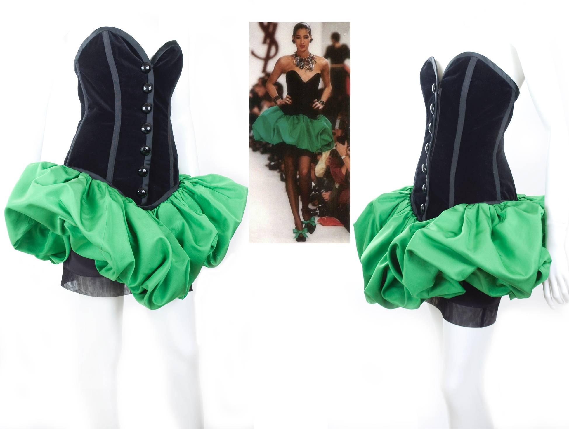 Yves Saint Laurent Bustier Dress with Balloon Skirt.
1986/87 Hiver collection.
Velvet bustier boned and hidden zipper in the front.
Silk ballon skirt in emerald green. It is a bid darker than appears on pics.
Beautiful trim and black glass