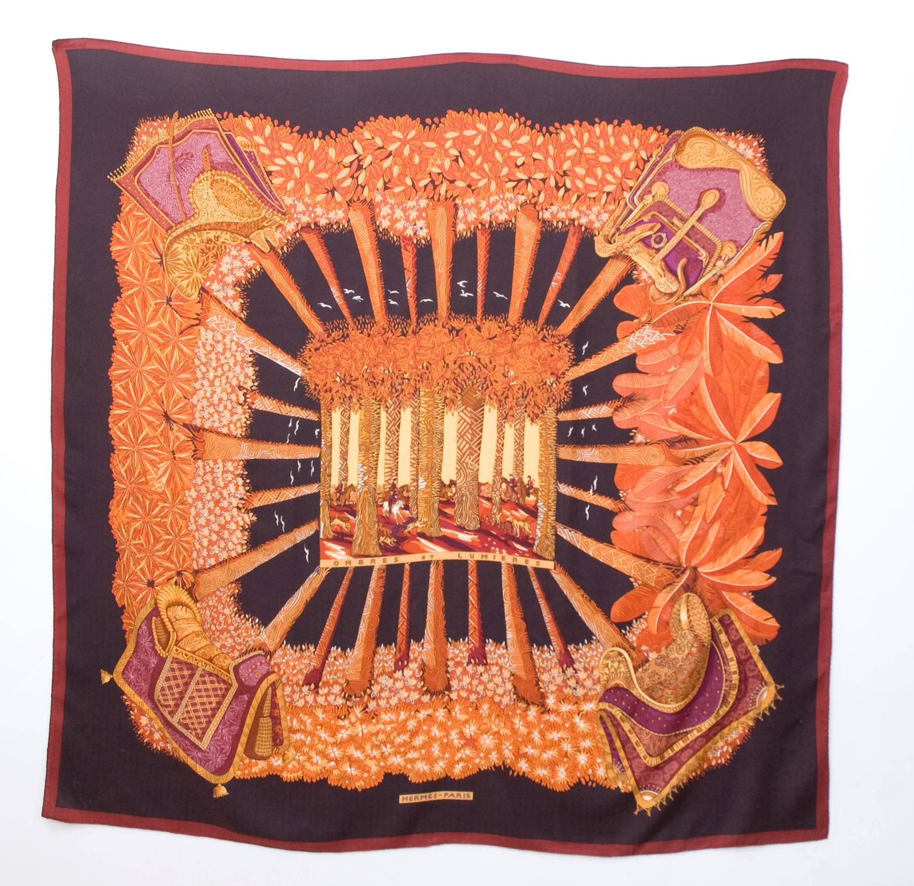 HERMES Ombres et Lumieres cashmere silk scarf in excellent condition and in original box. From 2001 designed by Annie Faivre features a beautiful design of lights and shadows among trees in beautiful autumn/winter colors.
XL size 135 cm x 135 cm