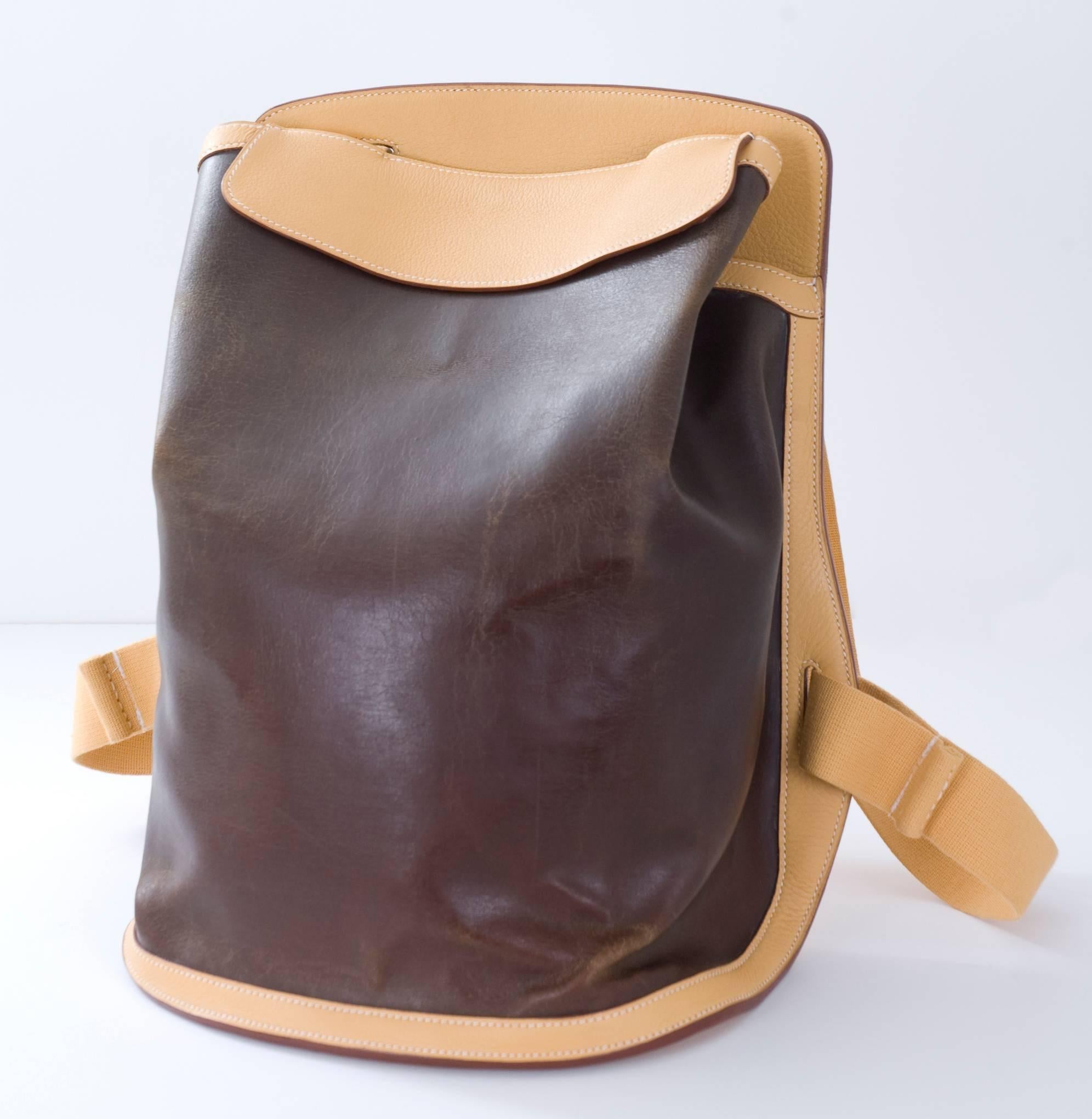 Hermes Etrusque backpack Clemence leather and natural rubber in the front with white stitching, slit pocket at interior and open top. 
Blind stamped Square C 1999.
There have been only few made by Hermes.
Very condition - The natural rubber