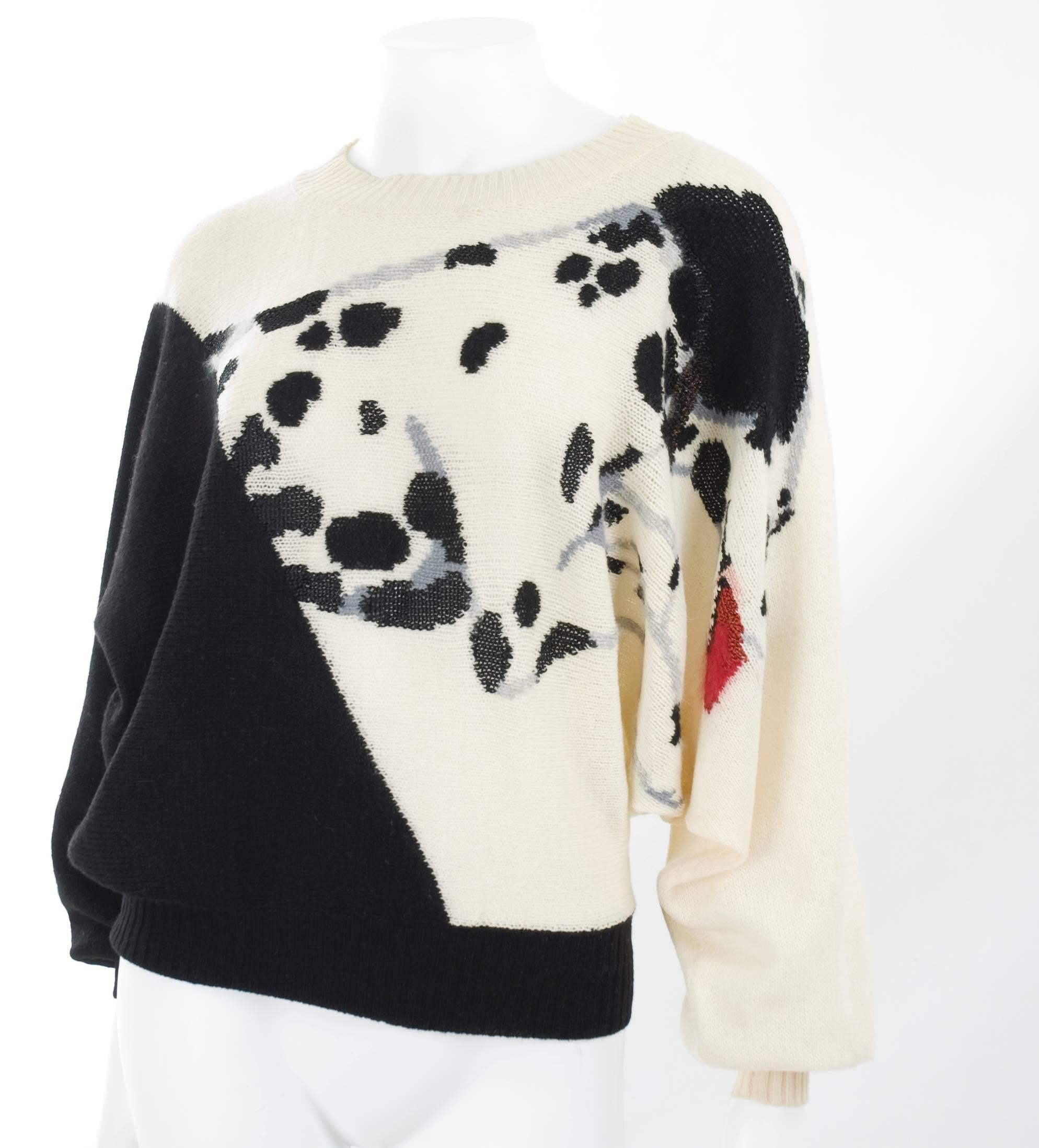 Krizia 1980s Black and Creme Dalmatian Sweater with batwing sleeves.
Krizia’s animal sweaters reached iconic status in the1980s.  
Super soft wool and angora mix. 
Excellent condition - no flaws to mention.
Size 46 Italy - about