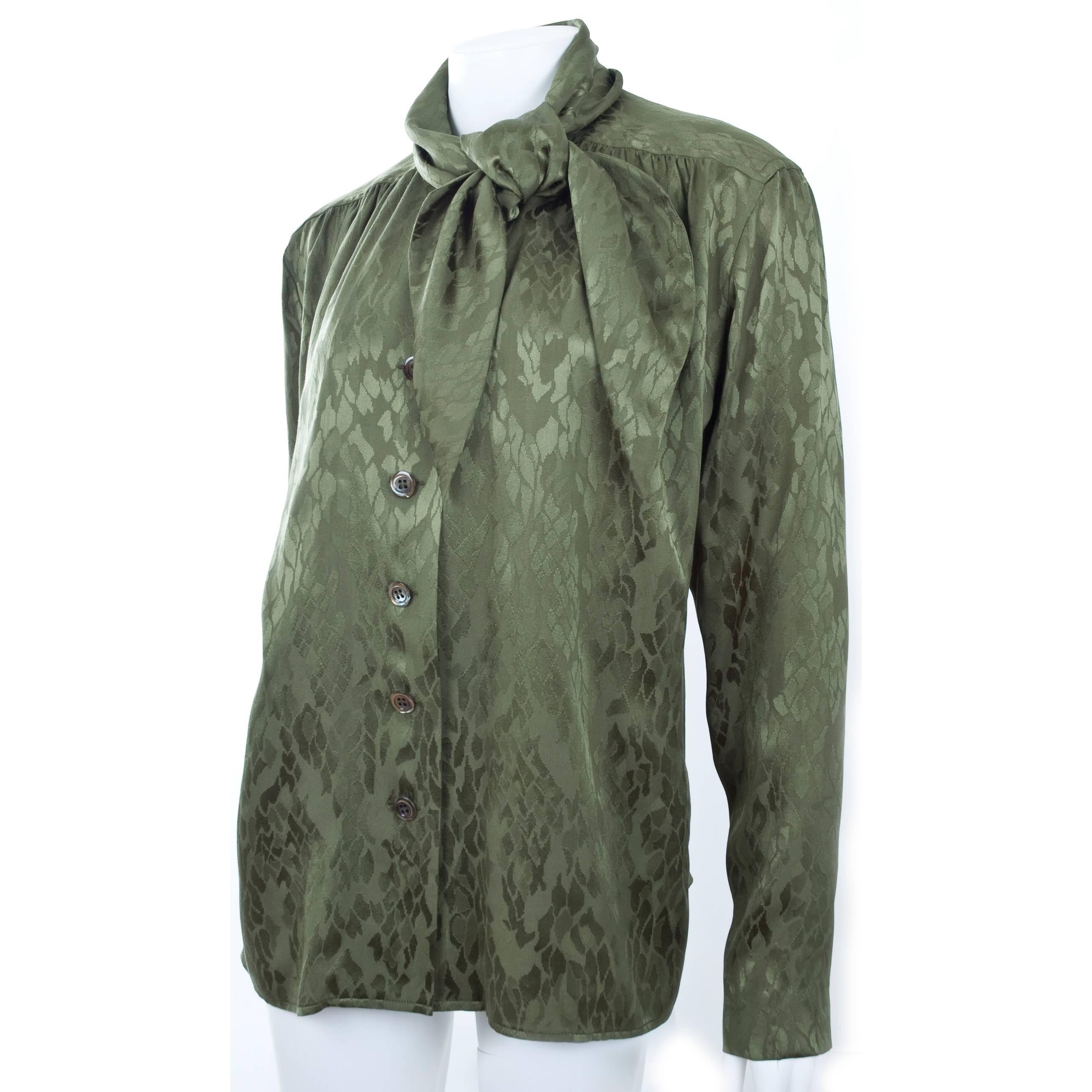 80s Vintage YVES SAINT LAURENT green silk jacquard blouse with tie neckline.
Size French 40 about US 6
Excellent condition - no flaws to mention
Measurements:
Length 26 - bust up to 40 inches.