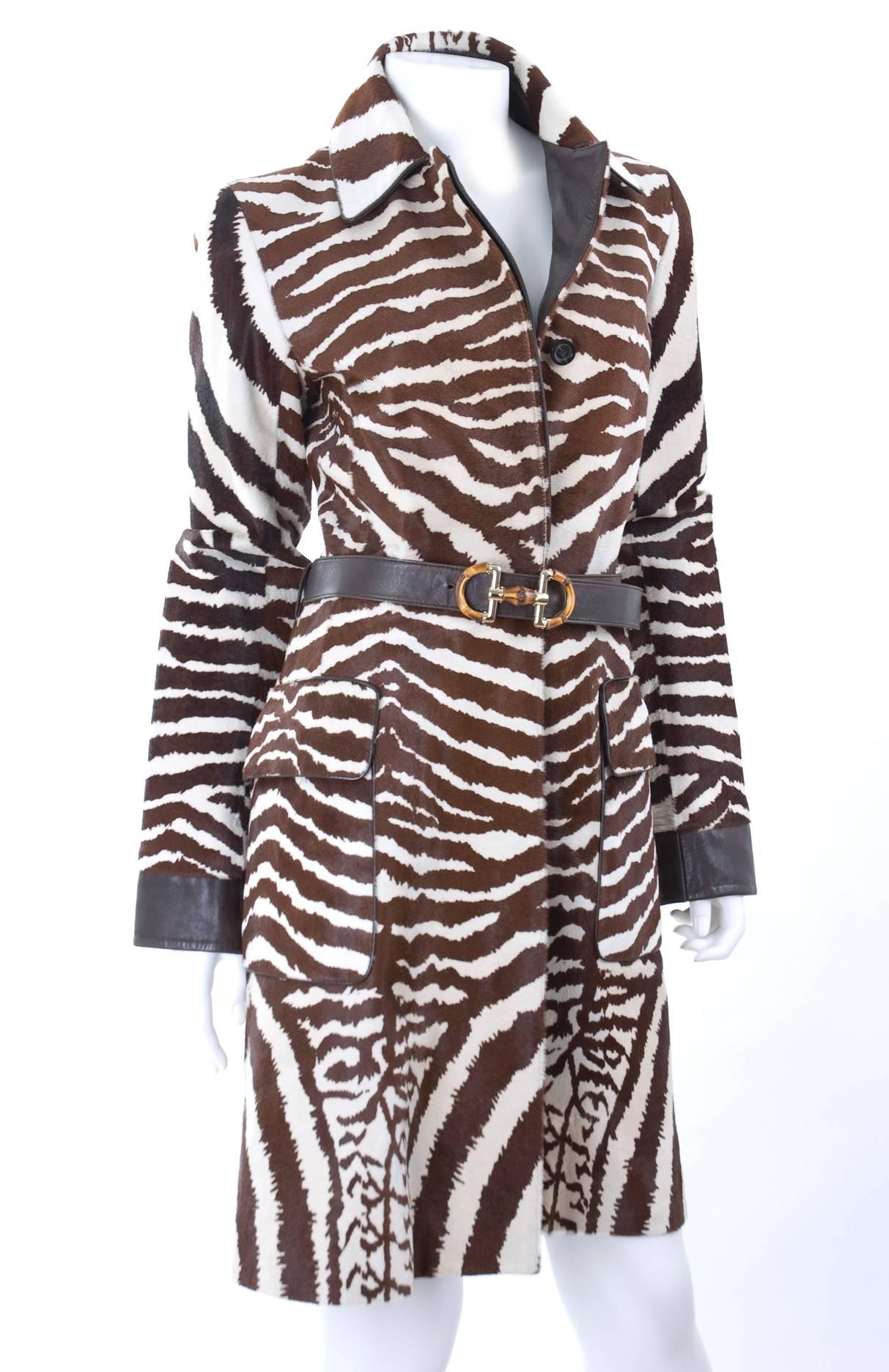 2007 Gucci zebra printed calf hair coat with brown leather trim and belt with bamboo buckle. 
Size 40 IT. - Fully lined.
Measurements: 
Length 38