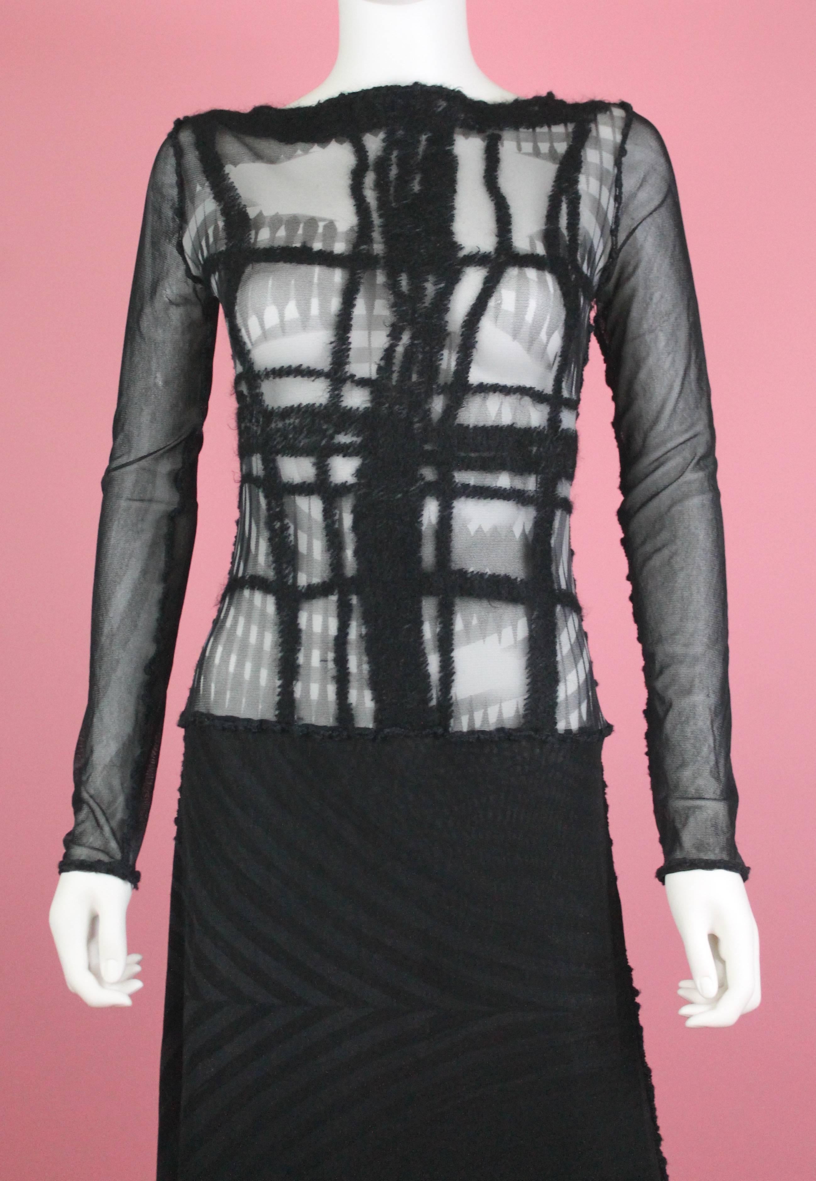 -One of my favorite pieces currently by French designer Jean Paul Gaultier 
-Features a print of Greta Garbo's face on both sides
-Backside isn't covered by fuzzy stitching
-Bottom half of dress features lined print
-True collector's item from