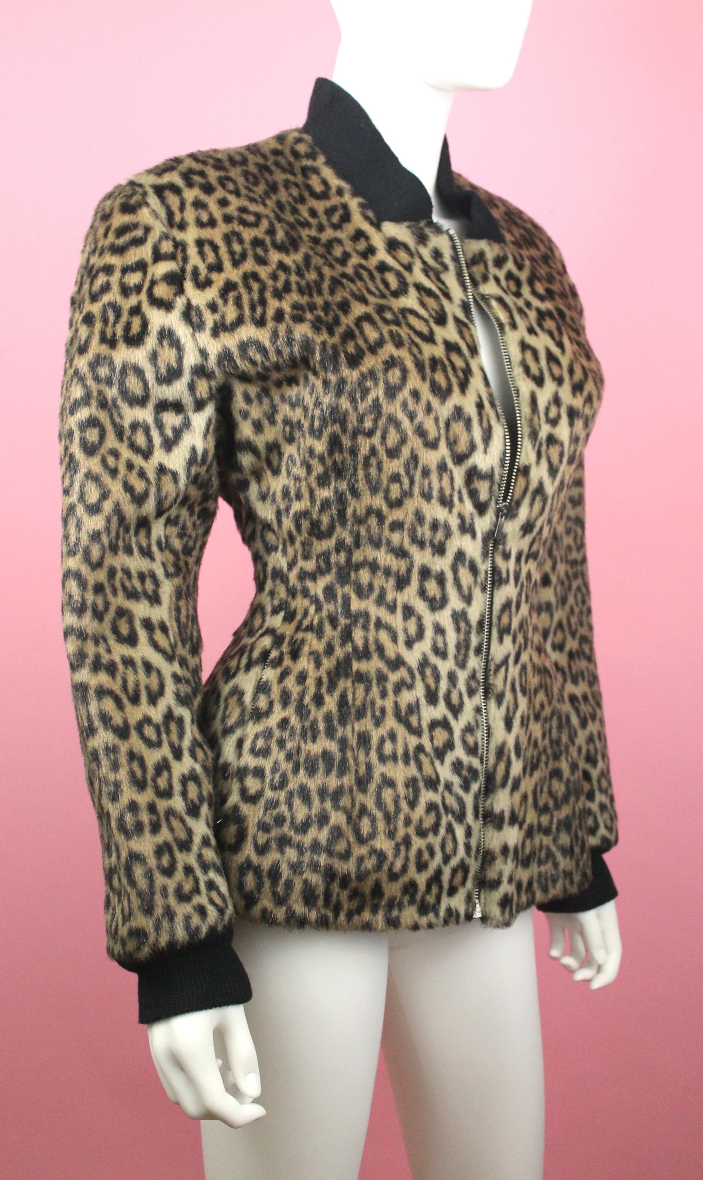 -Beautiful faux leopard fur jacket from Jean Paul Gaultier pour Gibo
-Has shaped waist, black ribbed cuffs and neck, 2 waist pockets 
-Black quilted lining 
-Made in Italy 

Approximate Measurements
-Total length: 27