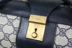 Gucci Guccissima Canvas & Leather Luggage Suitcase, c. 1980's, 16" H x 27"W
