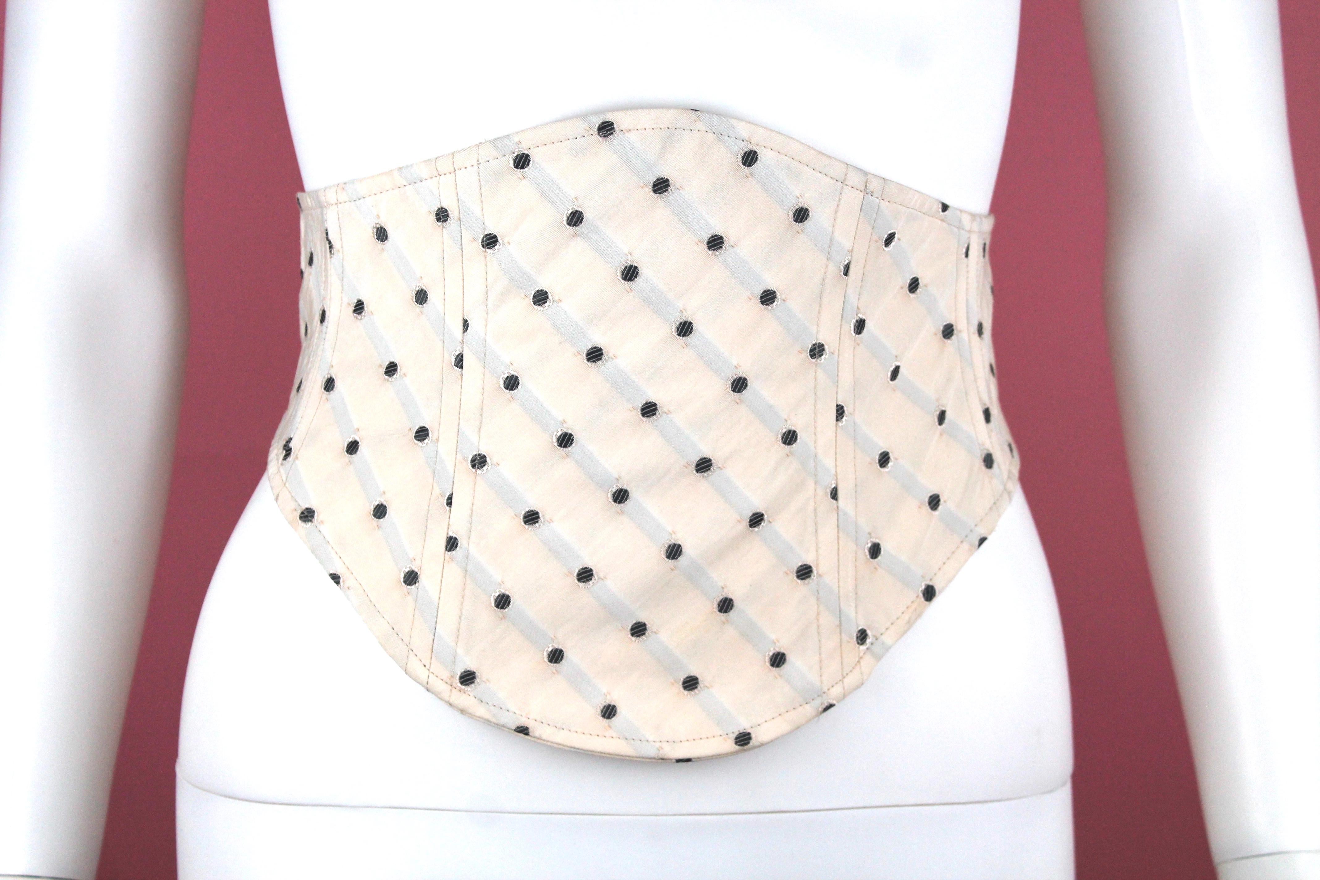 -Adorable cream waist cincher from Vivienne Westwood Red Label 
-Polka dot pattern with faint blue stripes all over 
-Dating of this piece is approximately Spring Summer 2010 
-Made of cotton blend fabric, has boning throughout
-Sized M 
-Made in
