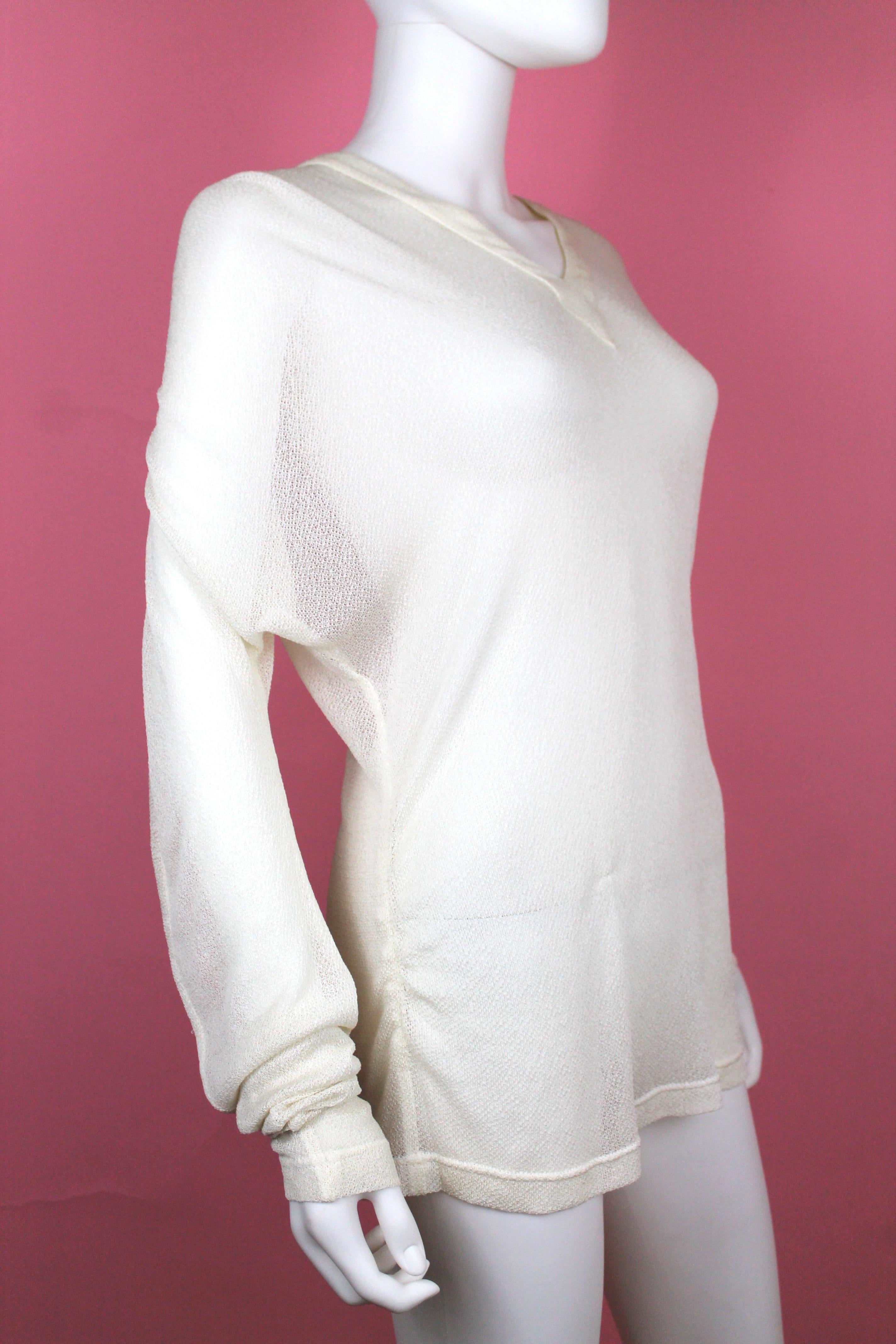 -Off-white v-neck top from Alexander McQueen 
-From Spring Summer 1997 collection, La Poupée, The Doll
-Has rounded elbows and interesting drape in front
-Made of sheer, gauze-like fabric with lots of stretch 
-Made in Italy
-Size and comp. label