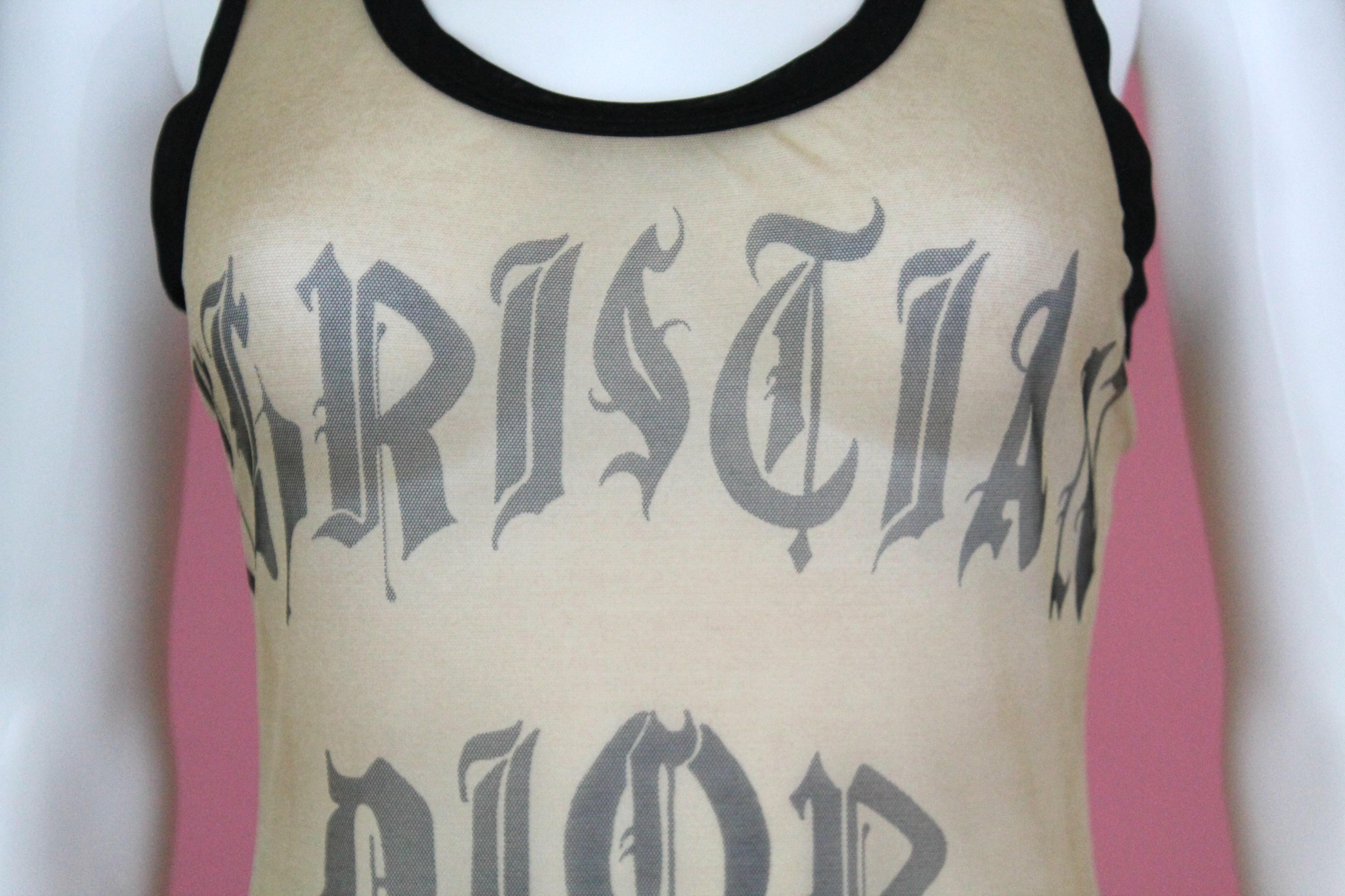 -Iconic Galliano for Diorpiece from Spring Summer 2002 runway
-Features Christian Dior logo on front with 1947 on back, in gothic type font
-Made in France
-Size US 8 but best fitting US 6 
-Could be a muscle shirt on the right guy.

Approximate