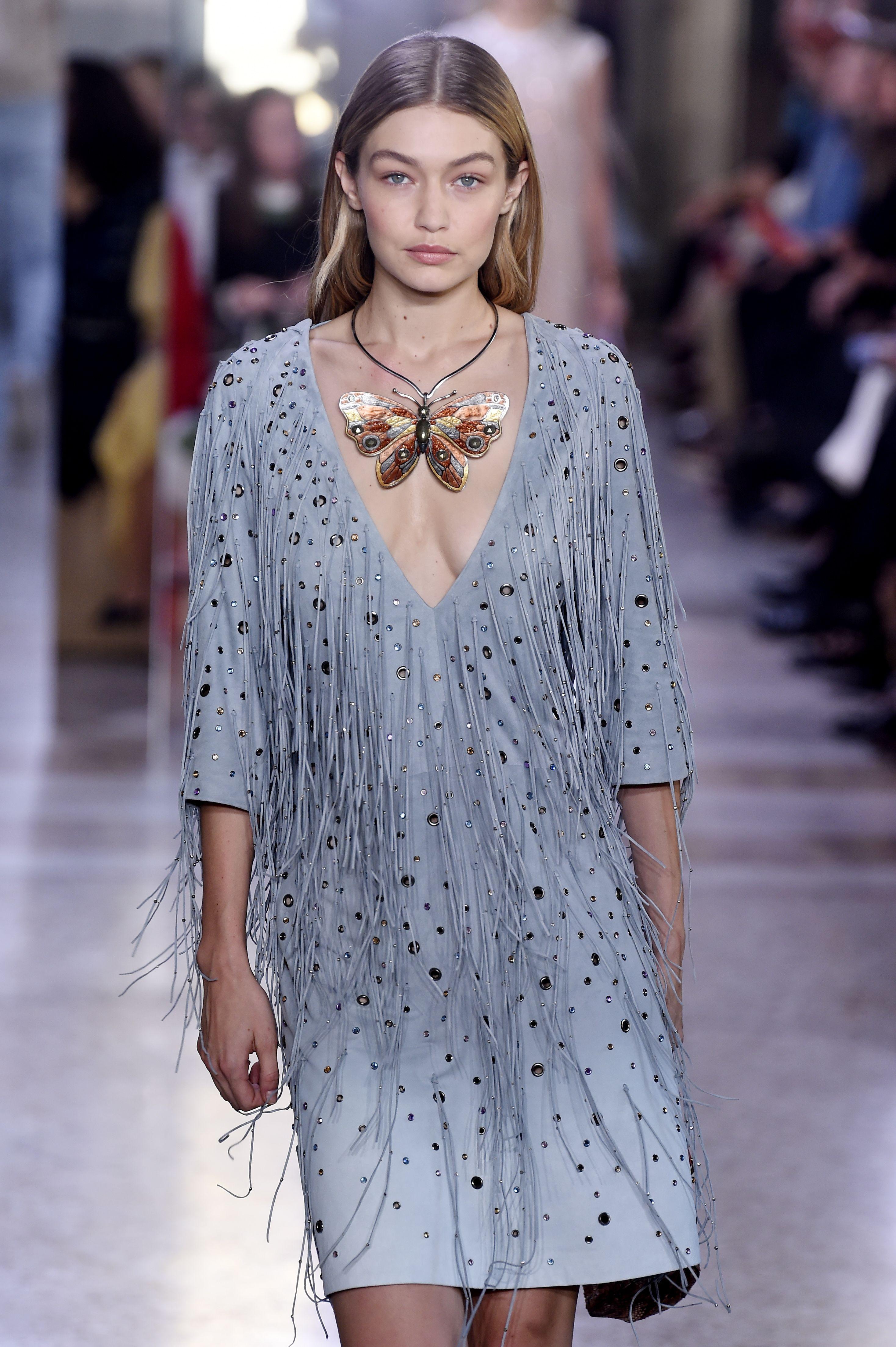 -Beautiful dress from Bottega Veneta Spring Summer 2018 
-Worn by Gigi Hadid on the runway
-Dress is made of powder blue suede, shaded by hand
-Hand-threaded beads on the fringe
-Made in Italy

Approximate Measurements 
-Total length: