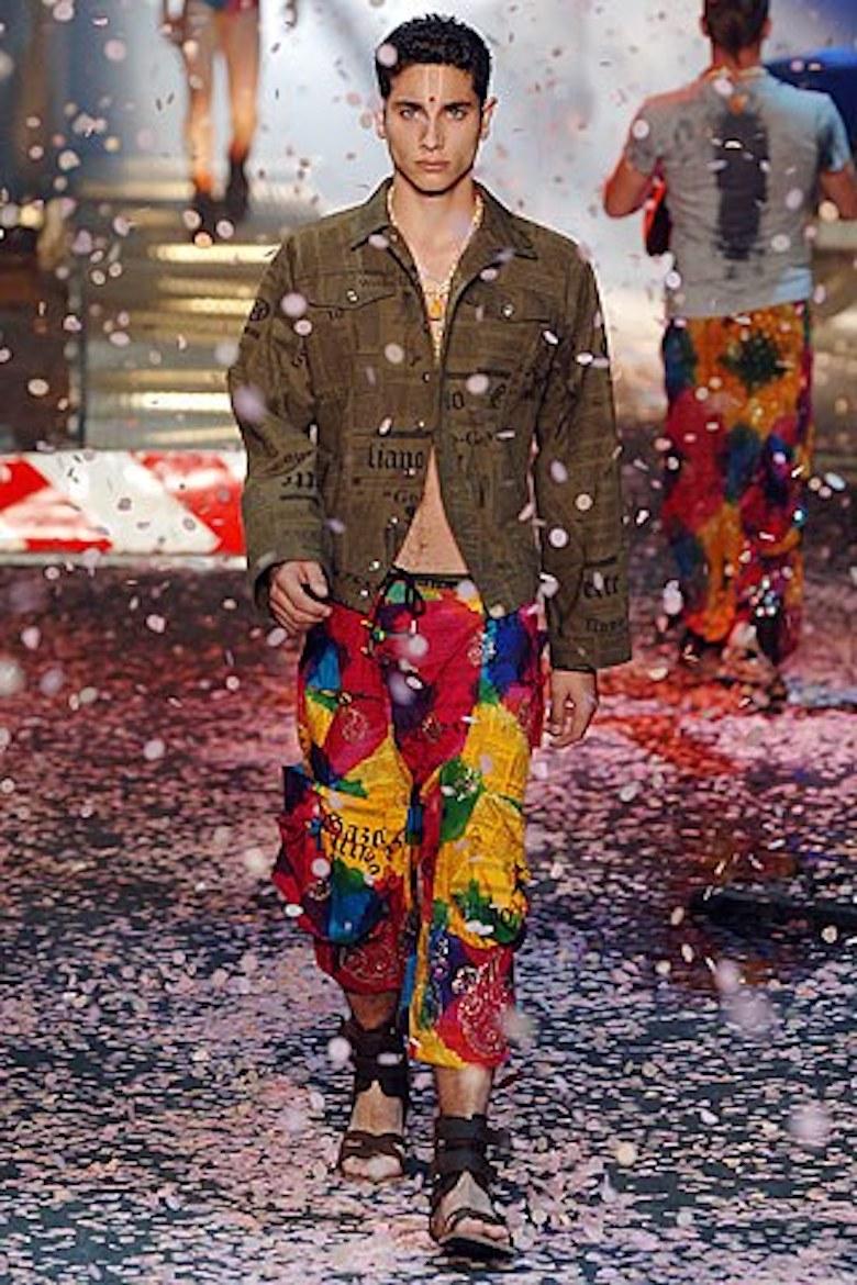 -V-neck from  John Galliano men's SS06 show in iconic Gazette print
-Has suede-like patch on the sleeve with logo
-Sized S, fits true to to size, has some stretch 

Approximate Measurements
-Total length: 26