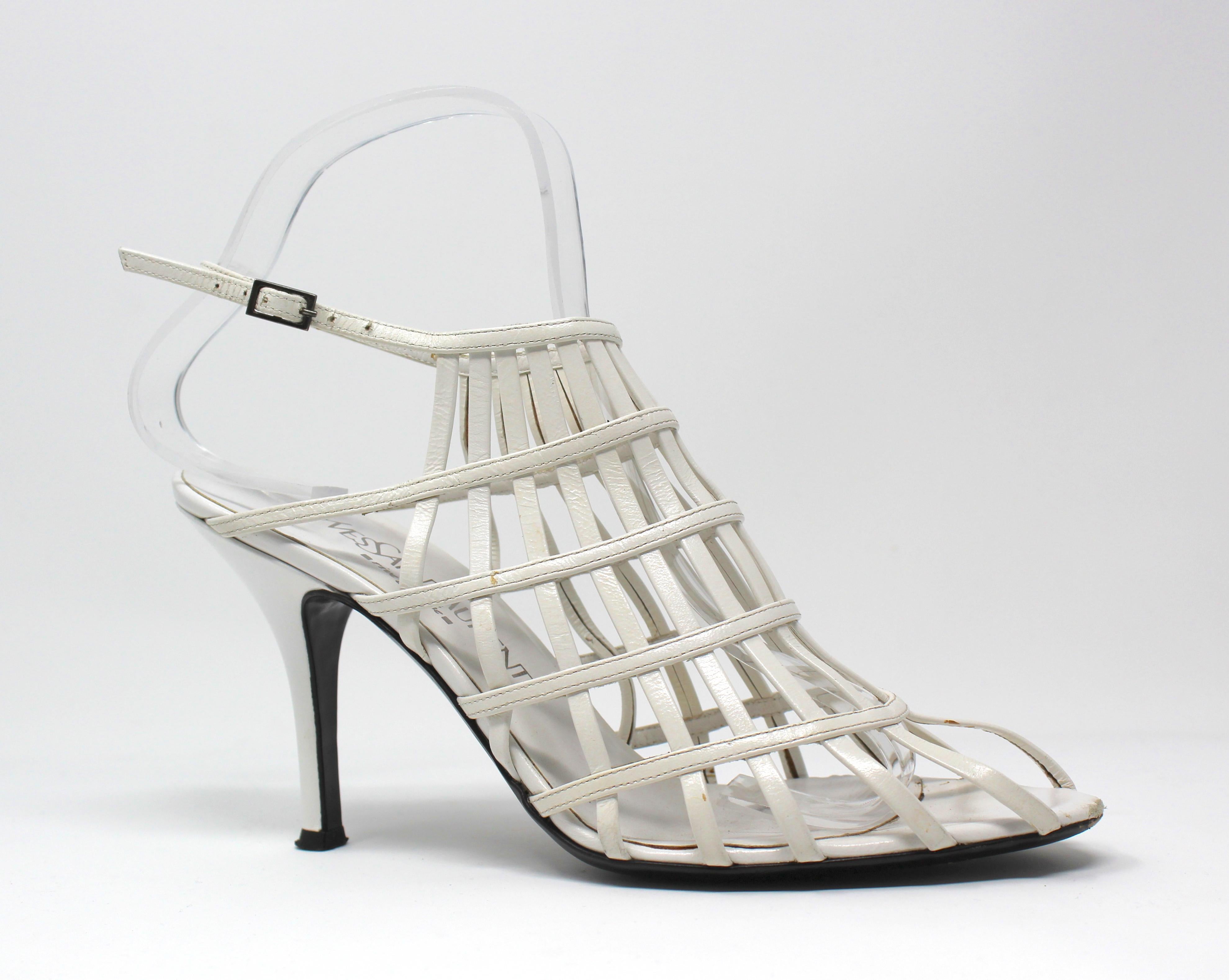 Yves Saint Laurent White Strappy Sandals 
-Gorgeous heels with peep-toe from YSL, 2000's
-Has cage like design, buckles in the back 
-Slim heel, all made in Italy, 100% leather
-Size 38 EU / 8 US

Condition:
-Great, inner sole is clean, bottom sole