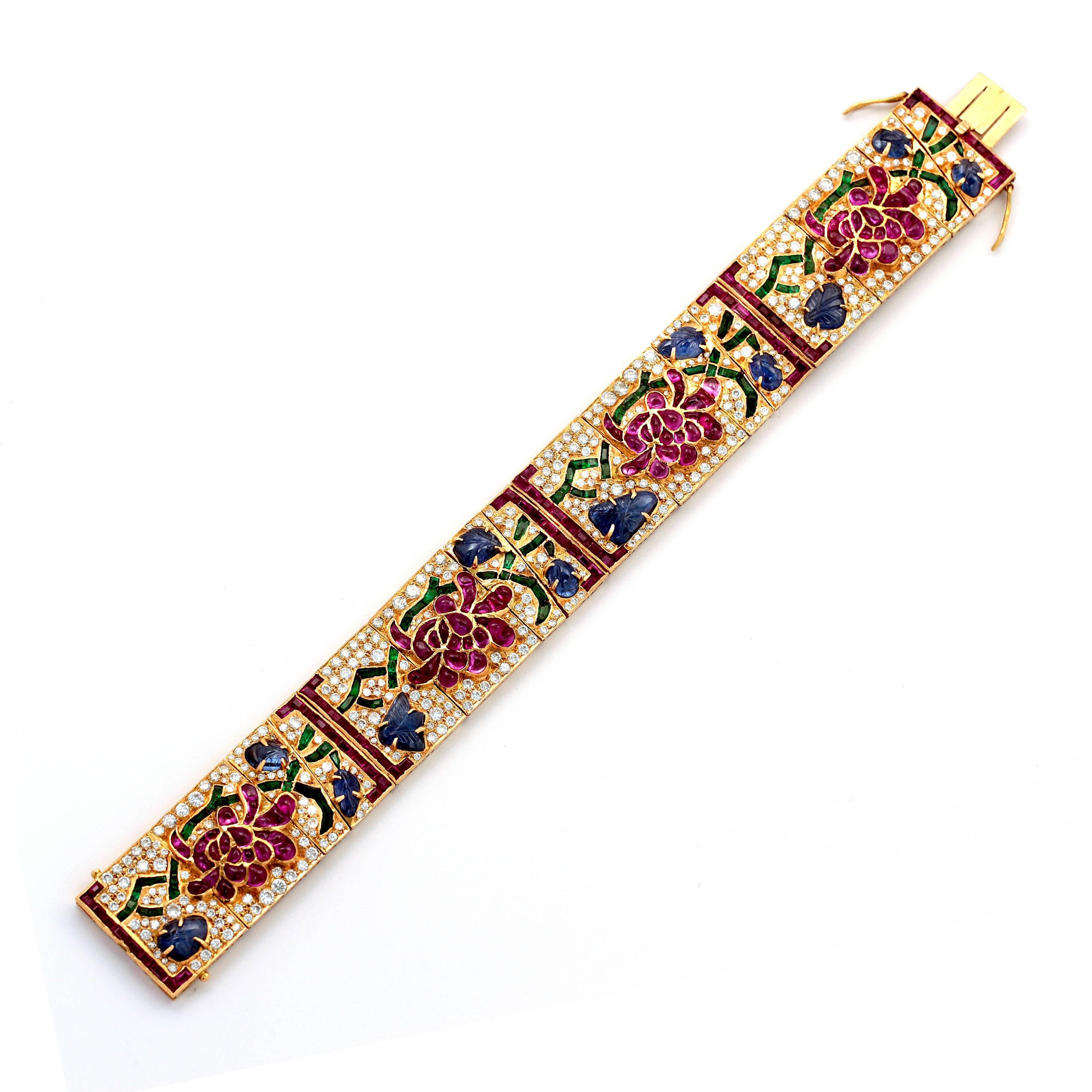 Mutli Gem Yellow Gold Bracelet with Diamonds, and Sapphires in a Flower design. In Excellent Condition For Sale In Los Angeles, CA
