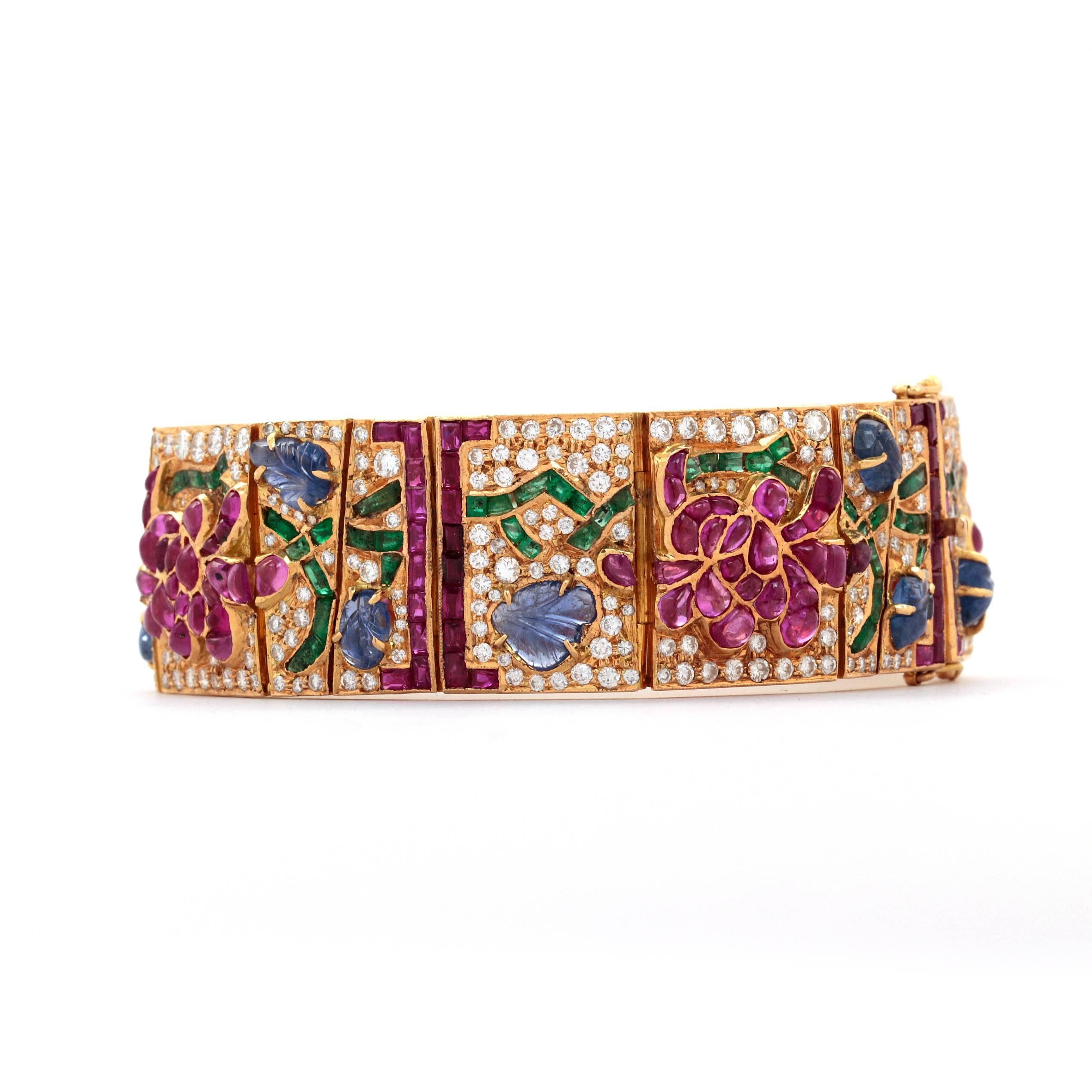 Mutli Gem Yellow Gold Bracelet with Diamonds, and Sapphires in a Flower design. For Sale 1