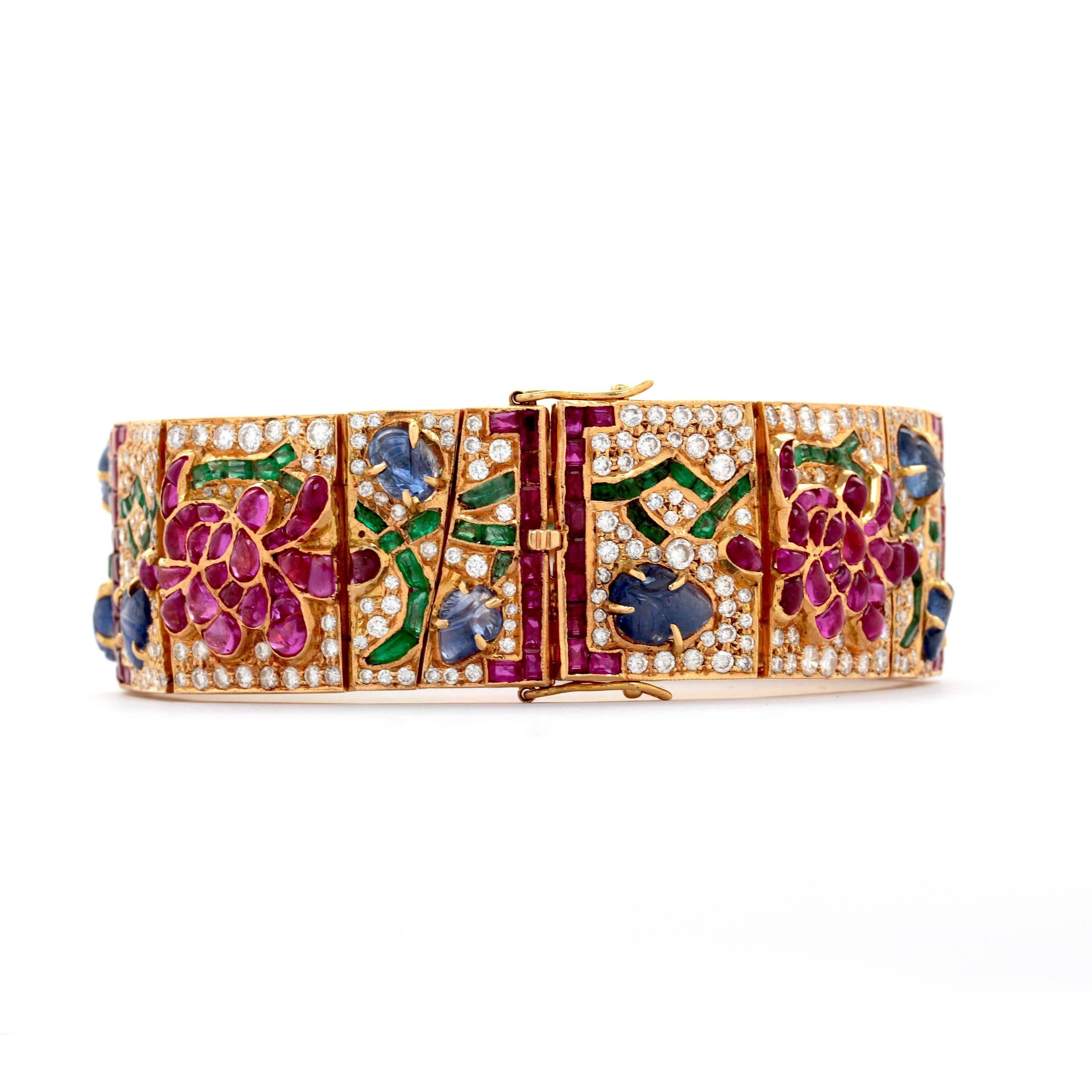 Mutli Gem Yellow Gold Bracelet with Diamonds, and Sapphires in a Flower design. For Sale 2