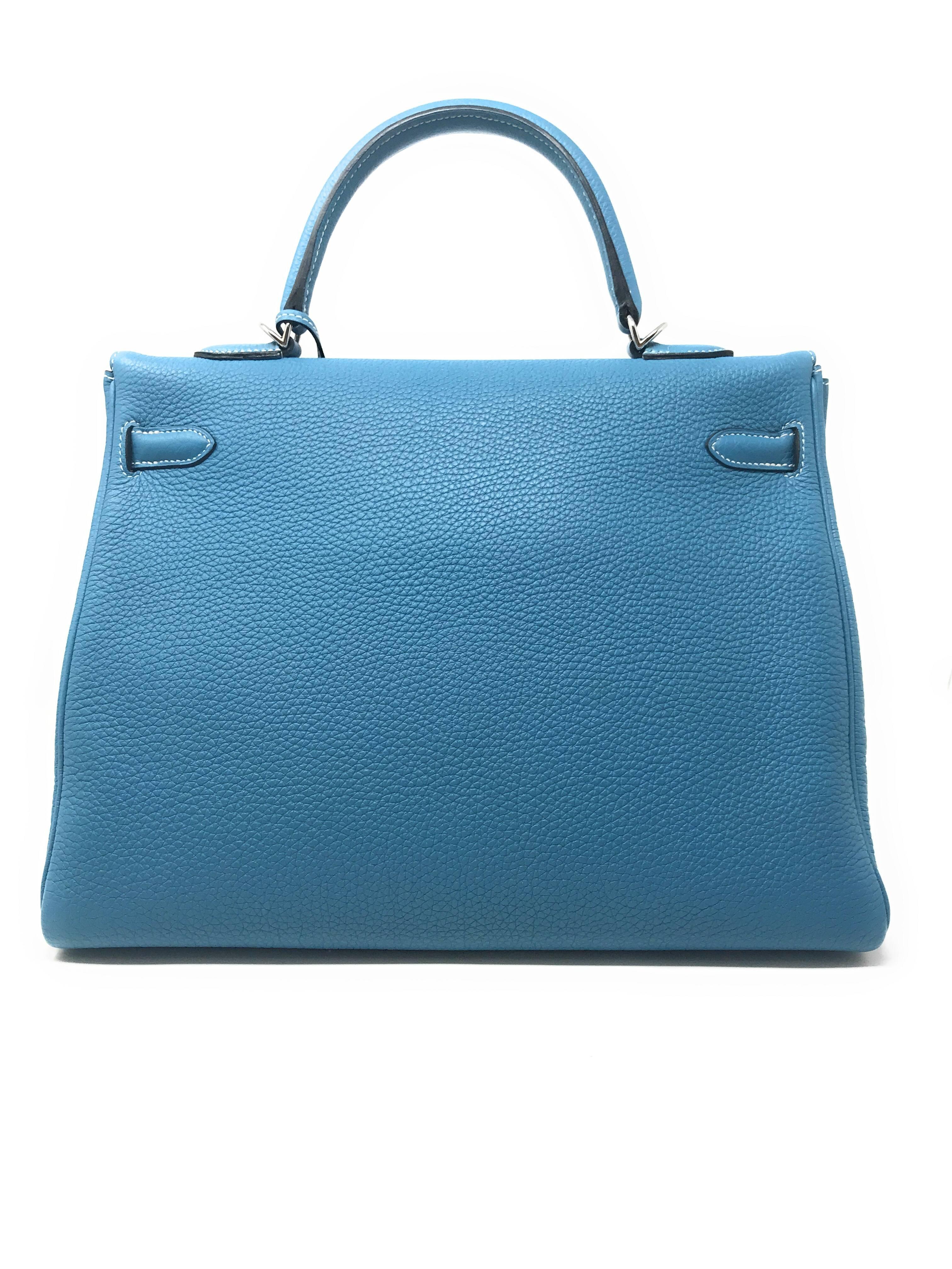 The iconic Hermes Kelly in the casual Blue Jean color that can be enjoyed on a daily basis. 
Crafted in the 35cm size of Togo leather, it is a versatile bag with a single top handle as well as a removable shoulder strap. 
It has white contrast top