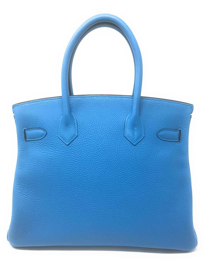 This rare Hermes Birkin 30cm is a combination of beautiful Blue Zanzibar exterior and gorgeous Green Malachite interior. 
Named after Jane Birkin, who collaborated on the design of this handbag, and it’s two-tone feature make this a truly