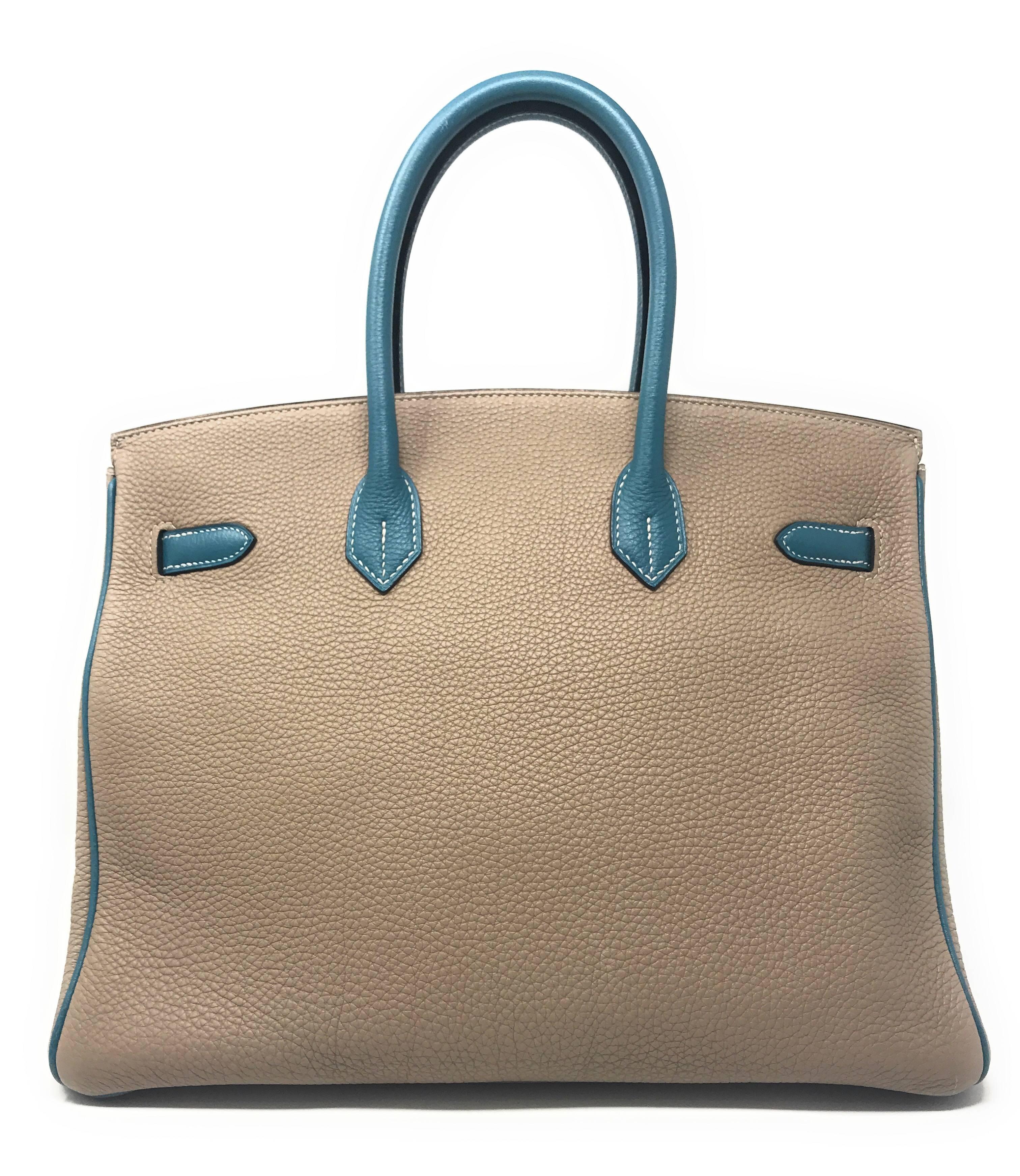 The very exclusive special order Horseshoe Stamp (HSS) Hermes that is only offered to VIP collectors to choose the color combination of their preference. 
This Birkin is the 35cm size crafted in a combination of Gris Tourterelle and Blue Jean