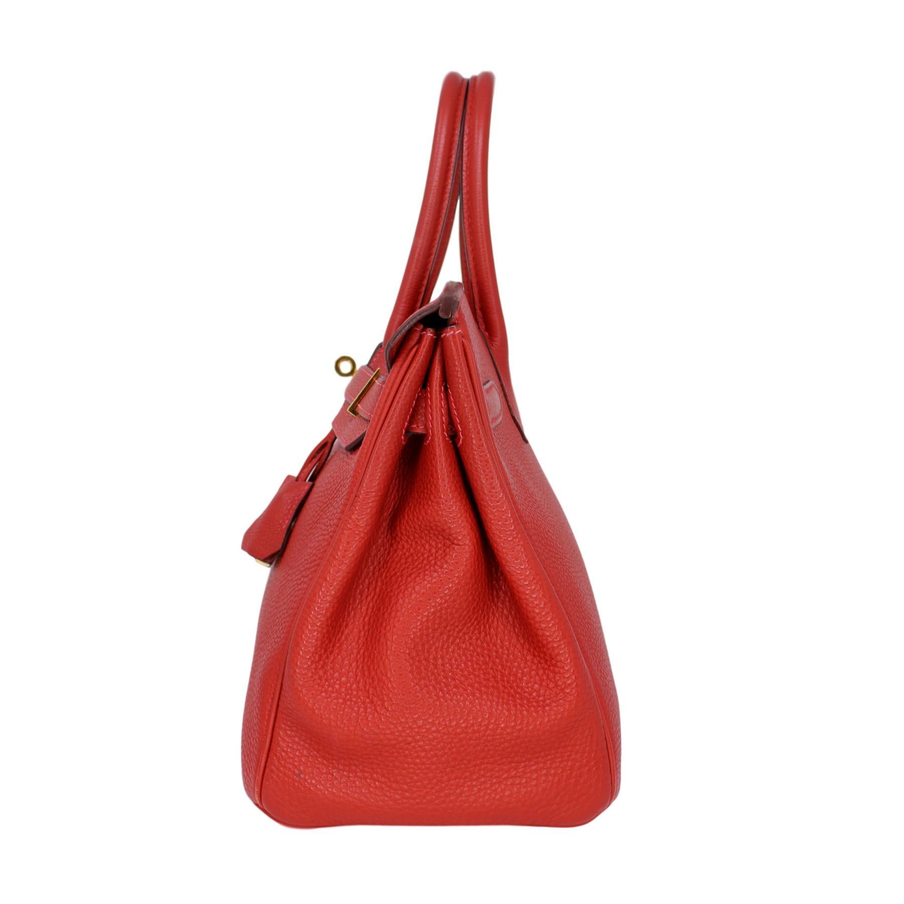 An intense red, this Hermes Birkin bag is the perfect pop of color to any ensemble. 
It is crafted in Togo leather with two rolled top handles and a flap closure. 
This is the 30cm size which is a compact size that can be enjoyed day or night. 
It