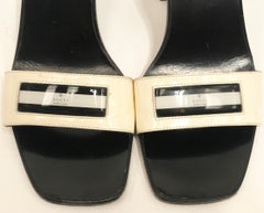 Gucci white charol and black leather Mules