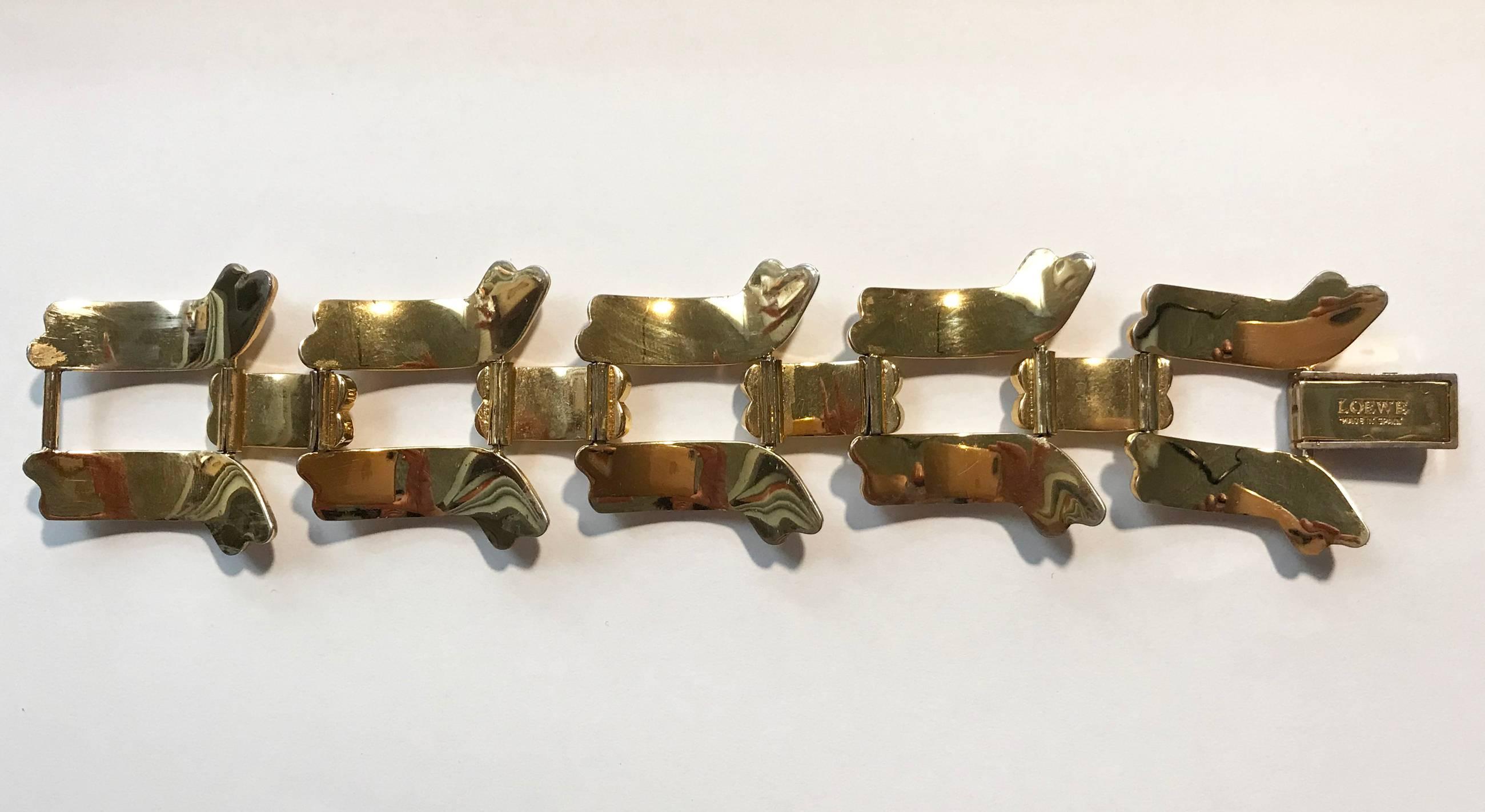 High quality gold colour metal bracelet by Loewe, 