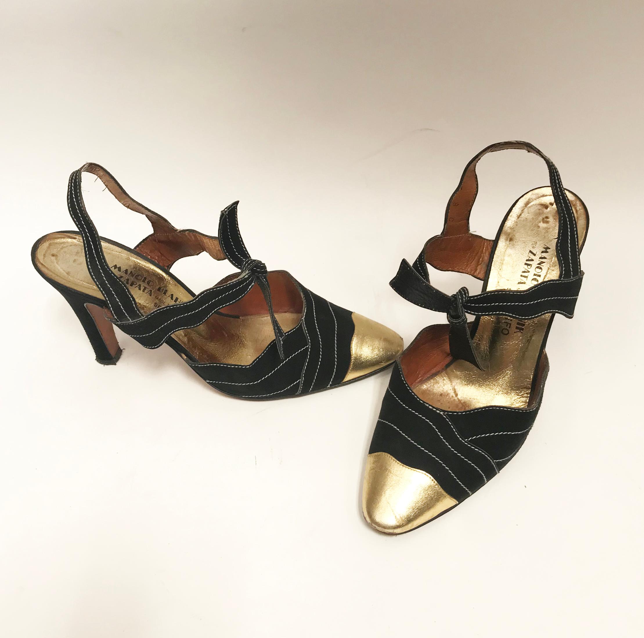Gorgeous Manolo Blahnik Black Suede and Gold Leather shoes.
These shoes are from the very beginning of his career when he started designing shoes in London  for the Fashion Shop  Zapata.
Size is European 38 from the 70's what today would be a