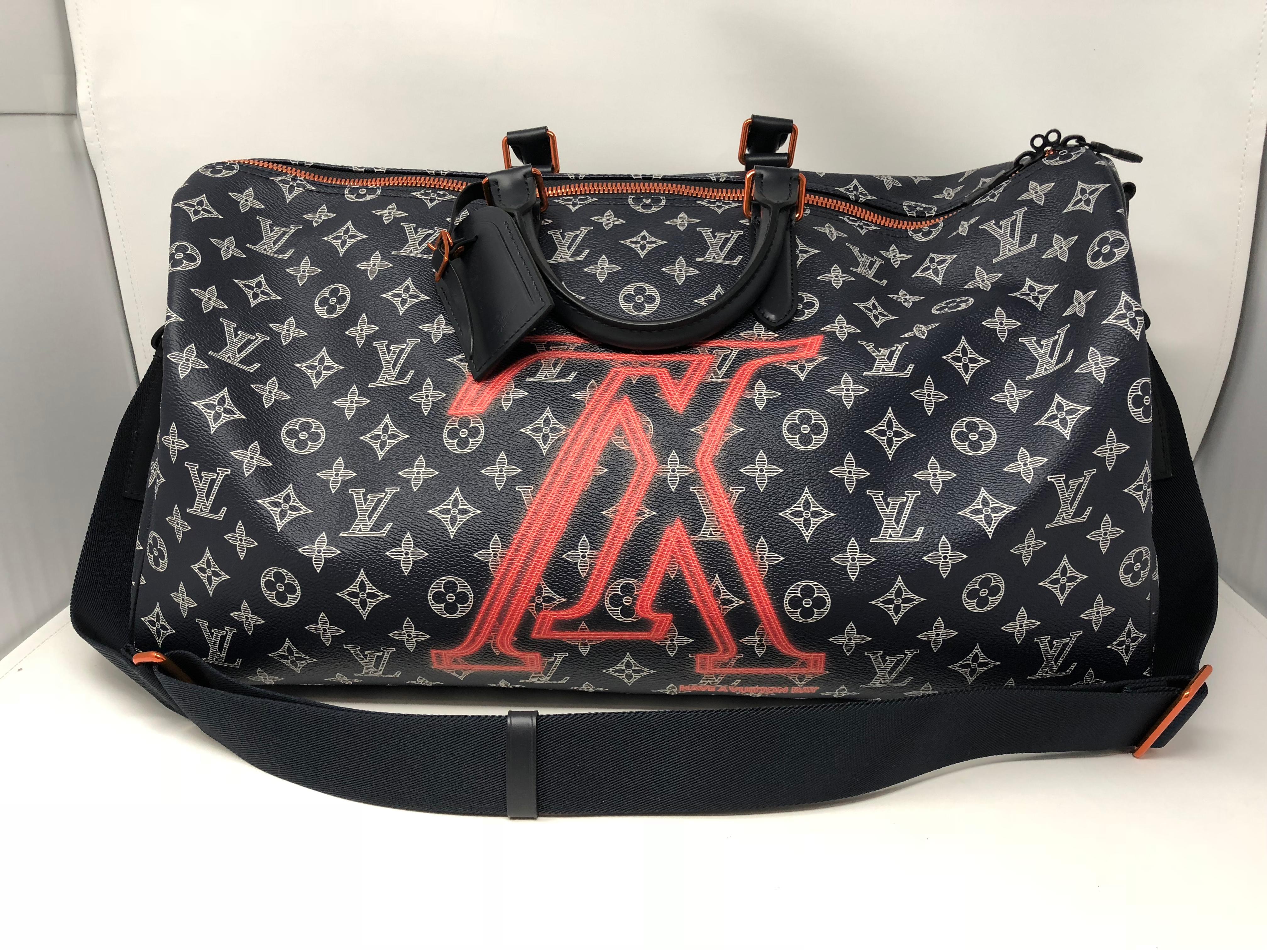 Louis Vuitton Upside Down Keepall Bandouliere 50 with strap. From Kim Jones 2018 Fall/ Winter  collection. Limited and sold out. For the true LV collector. Ink monogram with upside down logo makes this a must have for your collection. Brand new and
