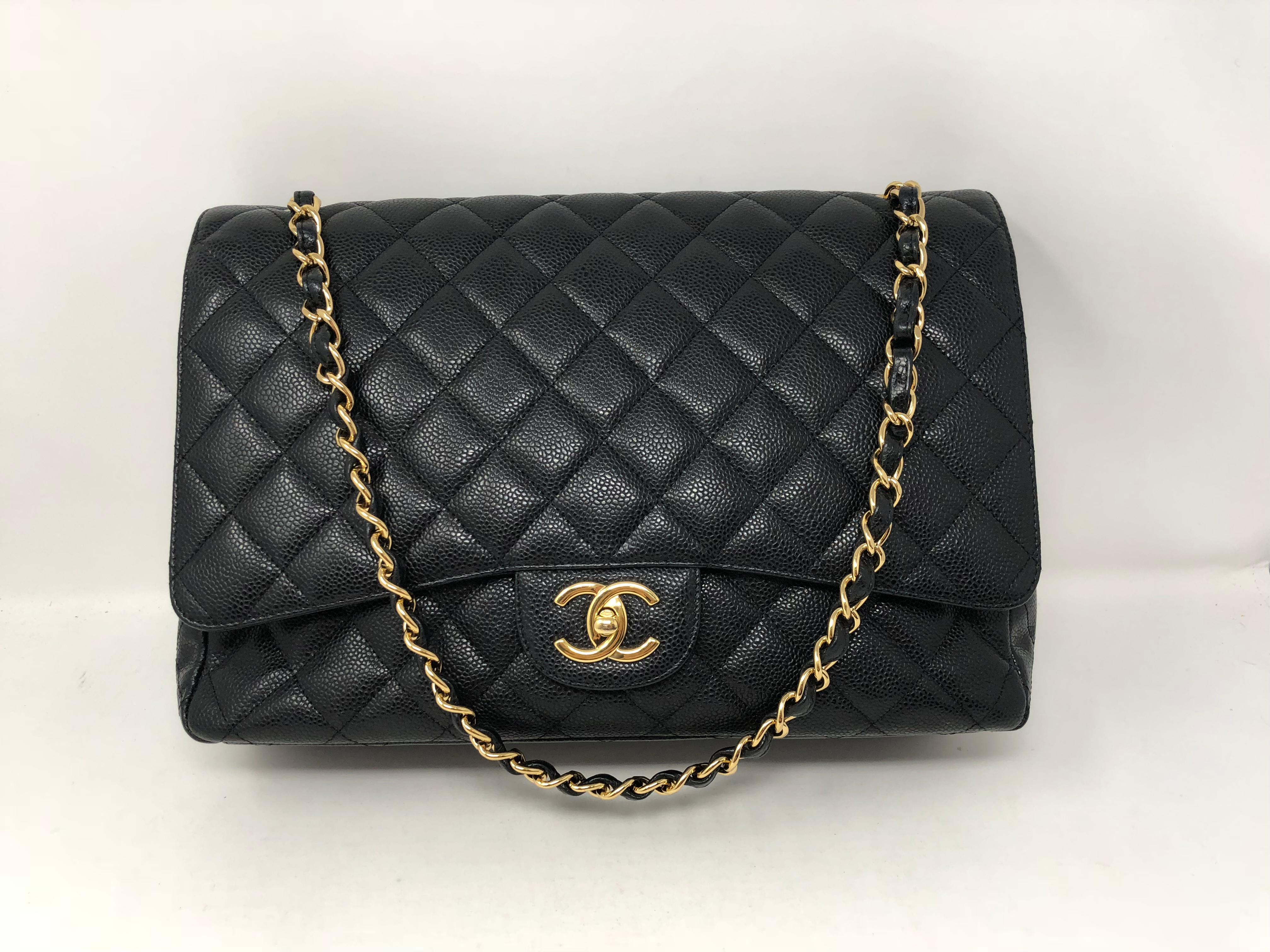 Chanel Black Maxi Caviar leather with gold hardware. Pristine mint condition. Black caviar leather is very durable and highly sought after. This is the largest size of the Classics. Double Flap. From series 16. Guaranteed authentic. Don't miss out