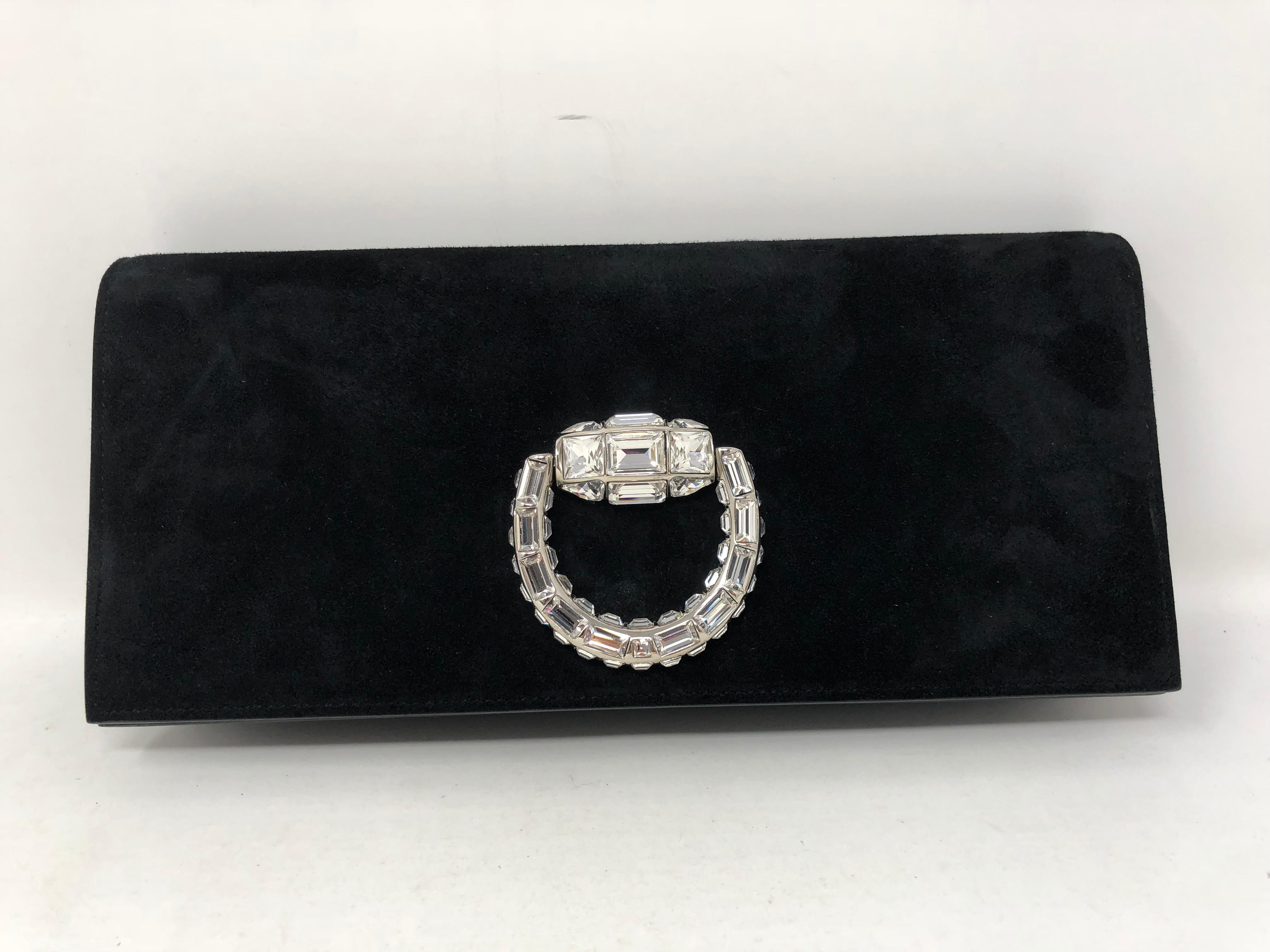 Gucci Black Suede Evening Clutch with Swarovski Crystal Clasp. Stunning and elegant clutch for any Special event. Mint like new condition and ready for the Gala. Guaranteed authentic. 